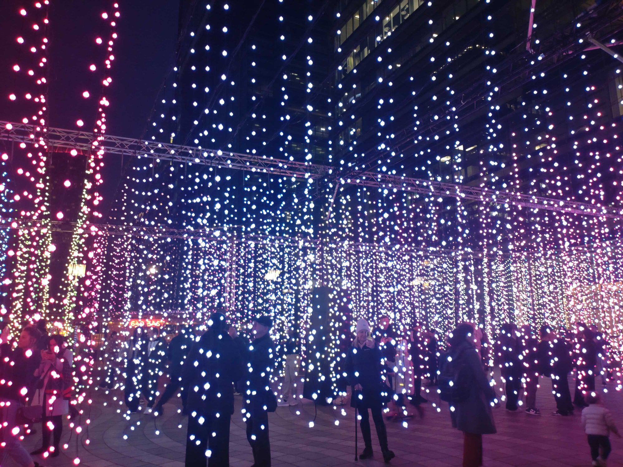 This large, immersive, walkthrough experience is comprised of many thousands of individual points of suspended light hanging down on strings. The light and sound changes colour and melody to create feelings of presence and movement.