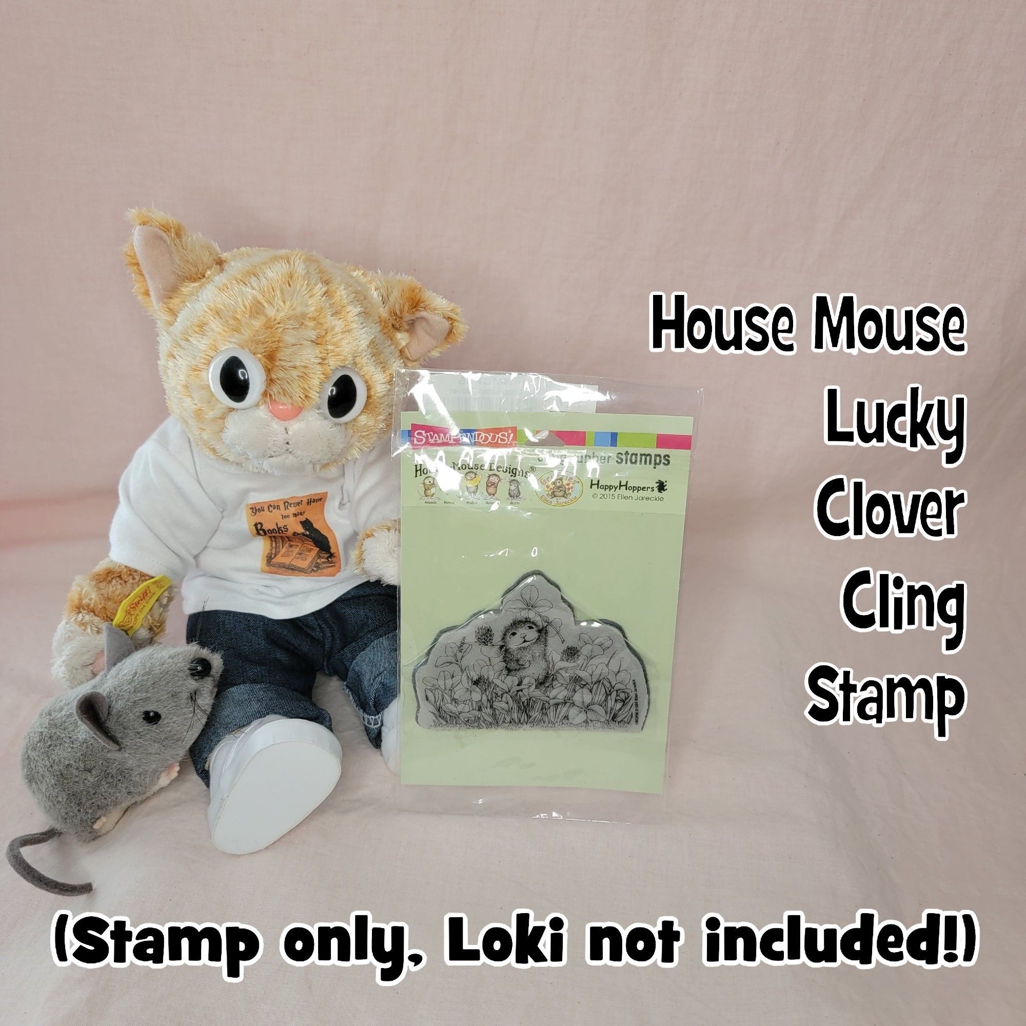 Loki and a plush mouse modeling with a House Mouse Lucky Clover cling stamp.