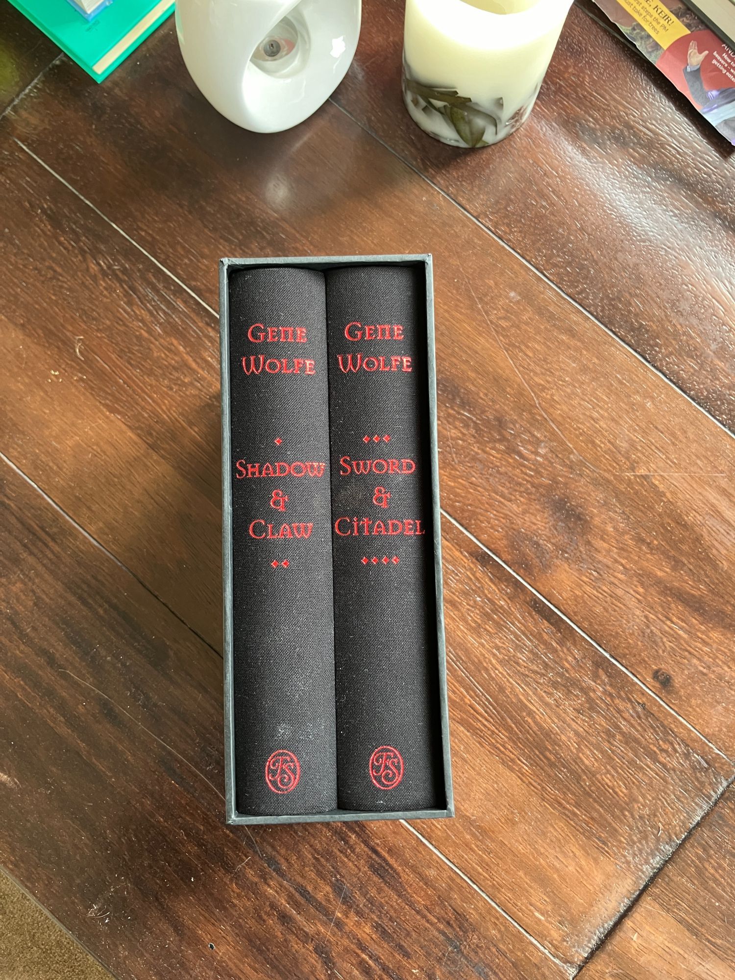 Spine on view of the Folio Society edition of Gene Wolfe's The Book of the New Sun