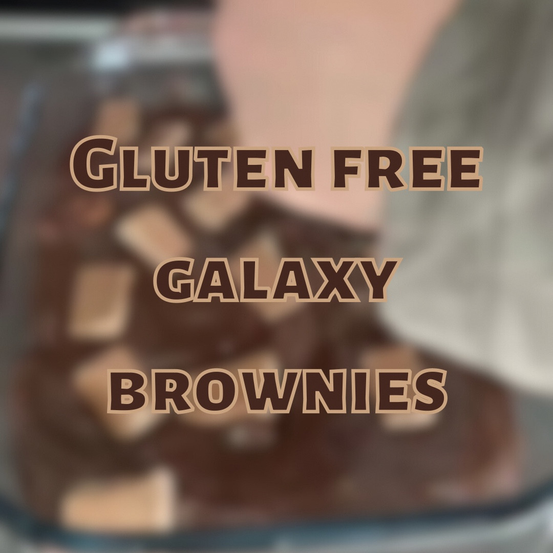 Text stating gluten free galaxy brownies in front of a blurred photo of galaxy brownie batter