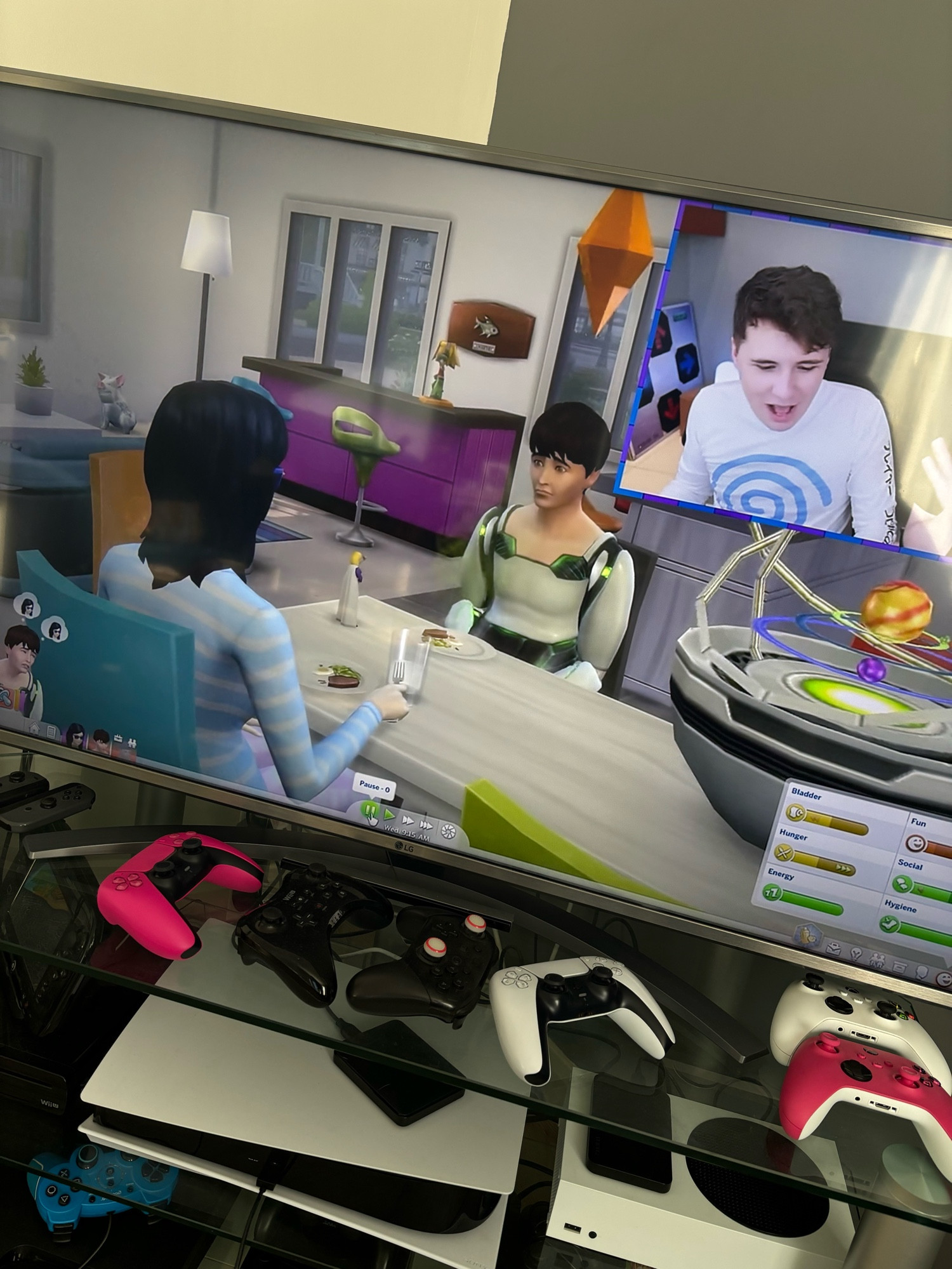 Dan and Phil playing Sims 4 on my TV