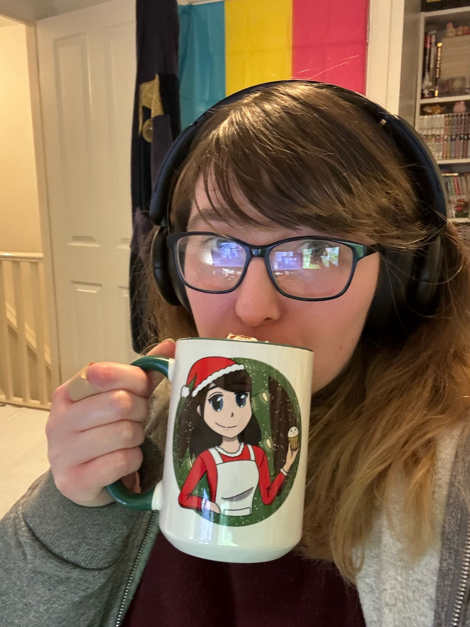 Me sipping from a CharlTheWeeb mug