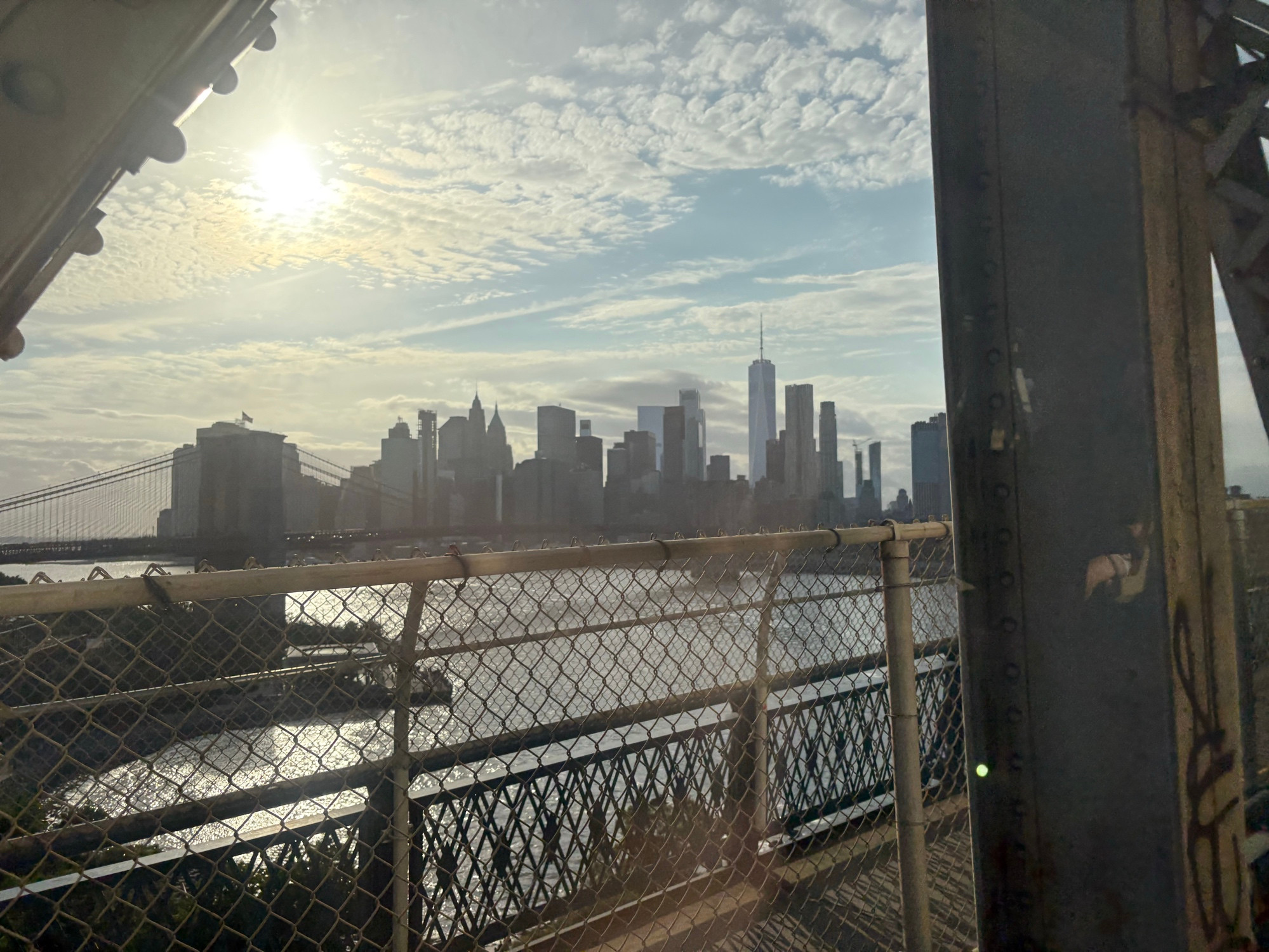 Southern Manhattan as seen from a Brooklyn bound Q on the Manhattan Bridge. The sun is shining and things are beautiful. It’s a city we should be able to afford. 
