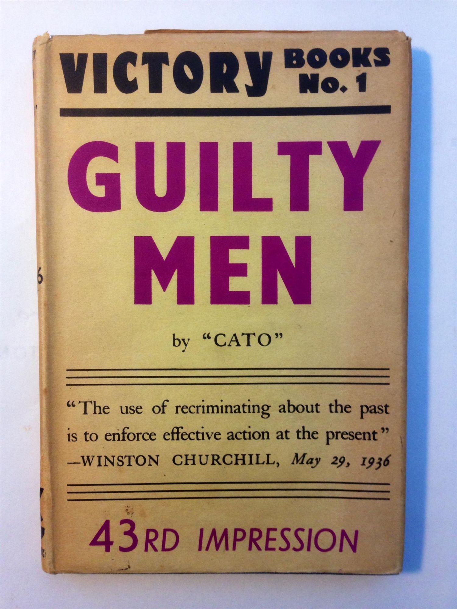 World War II book

yellow dust jacket
series title in black: Victory Book No. 1
title (in purple): Guilty Men
by "Cato" (in black)
"The use of recriminating about the past is to enforce effective action at the present"
--Winston Churchill, May 29, 1936
43rd impression in purple

the book attacked the appeasement policy that led to the outbreak of war, as well as the British military collapse at the start of the conflict

The three anonymous authors were Michael Foot, Frank Owen, and Peter Howard

https://en.wikipedia.org/wiki/Guilty_Men