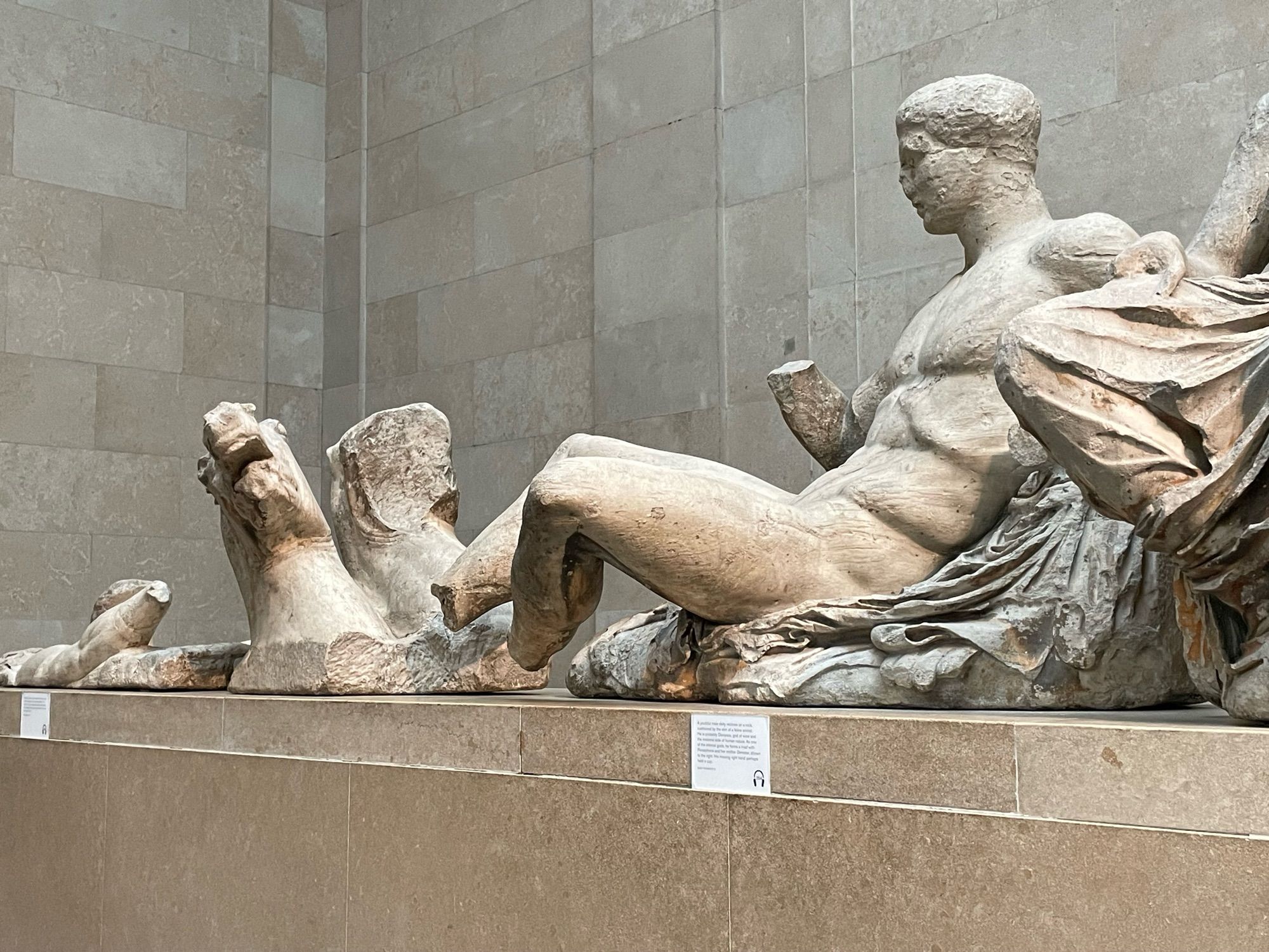 A selection of marble statues looted from the Parthenon by the British, including a reclining naked man and a screaming horse’s head. Me too, horse.