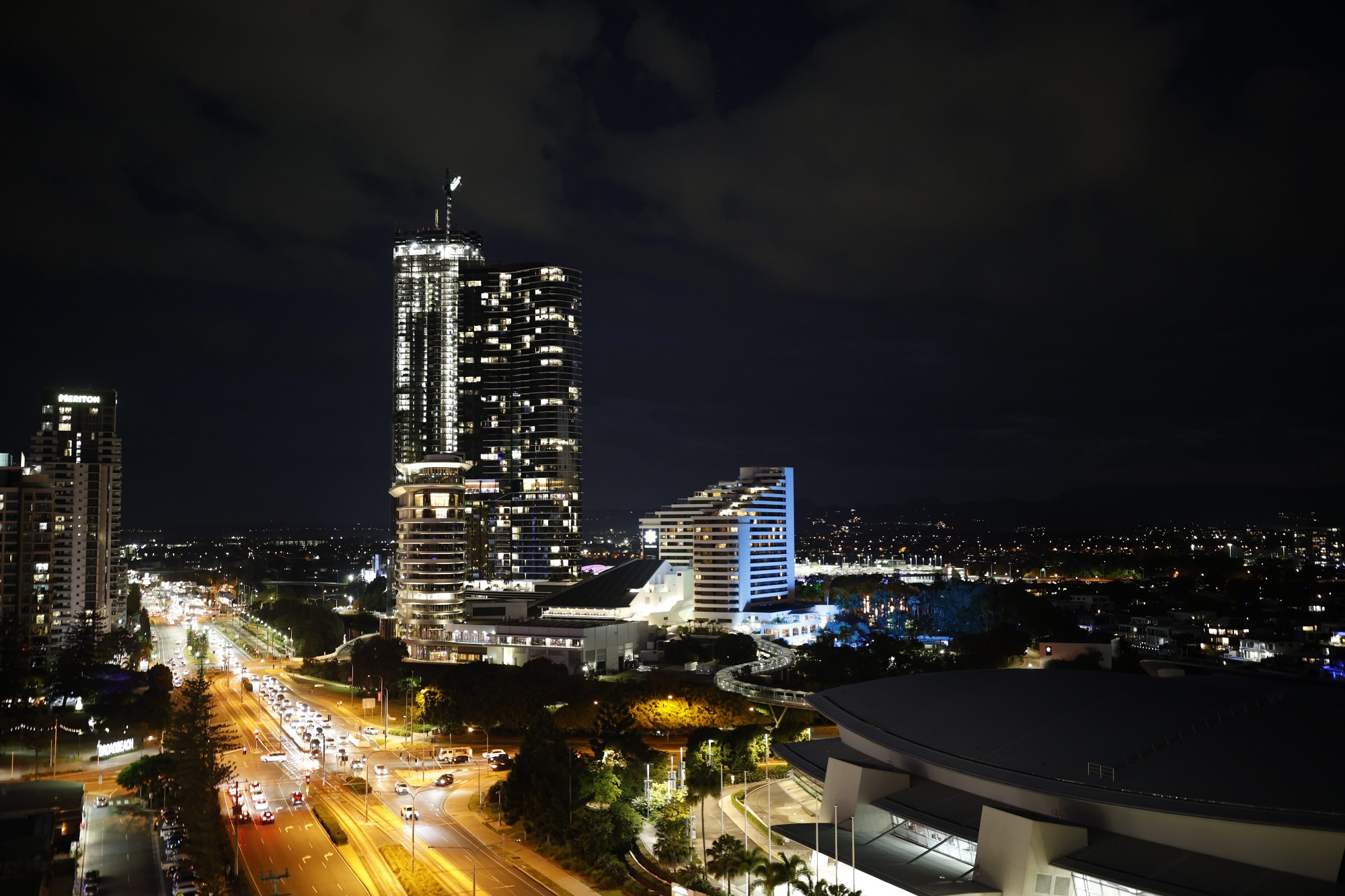 Image of the Gold Coast Skyline at night with parts of the convention center.