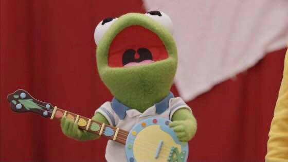 baby kermit playing the banjo