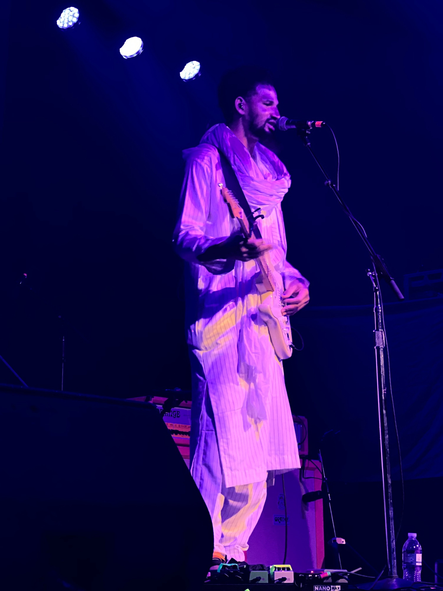 Mdou Moctar bathed in purple light plays at the First Avenue Mainroom.