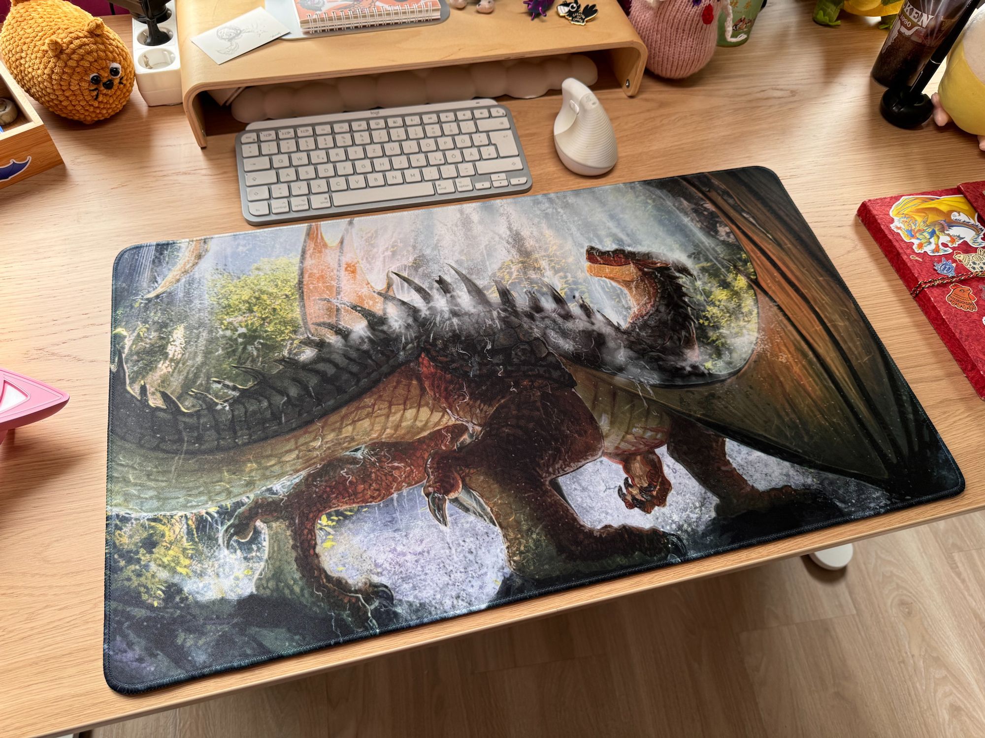 A big mousepad / playmat 70x40 cm featuring a mudwing under the waterfall painting