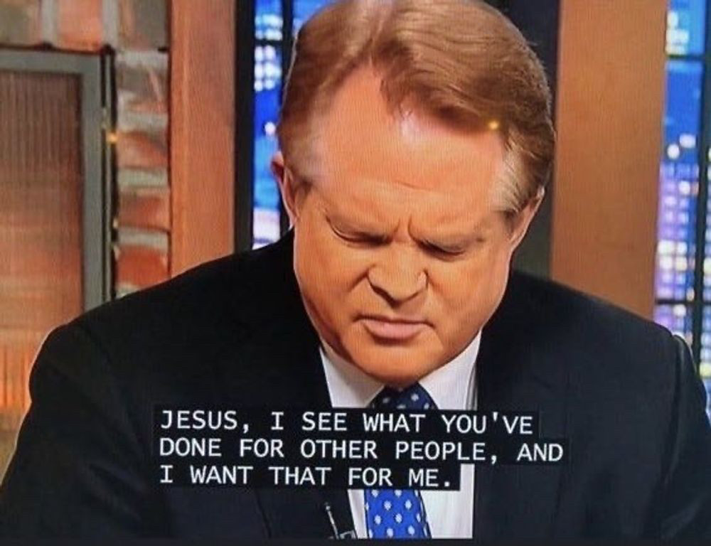 A white man in a black suit and blue tie, his eyes closed, says “Jesus, I see what you’ve done for other people, and I want that for me.”