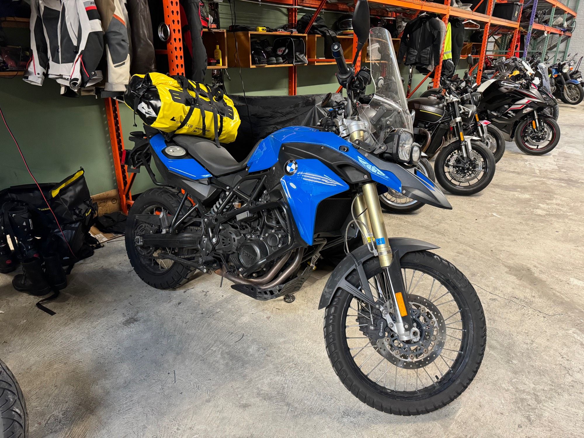 amber’s f800GS, here loaded with a dry bag on the tail with her leathers to head to the track