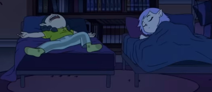 Screenshot from the first episode of the third season of The Owl House, depicting Willow Park and Amity Blight sleeping in separate beds. While Amity is depicted sleeping in a relaxed pose under a blanket, Willow is slept in a more chaotic pose, with her blanket slightly on the floor. 