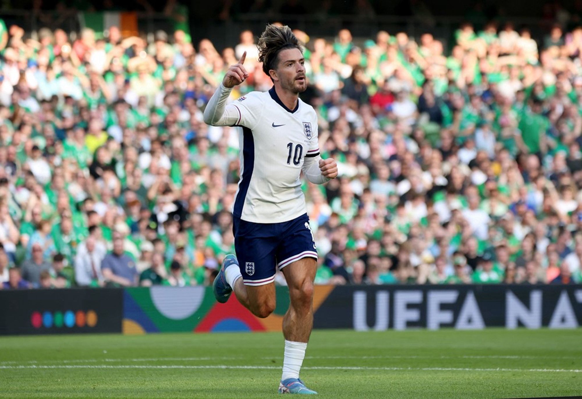 No muted celebration from Grealish. Quite the opposite in fact. He leaps into the air in front of the elated England fans after finding the bottom corner