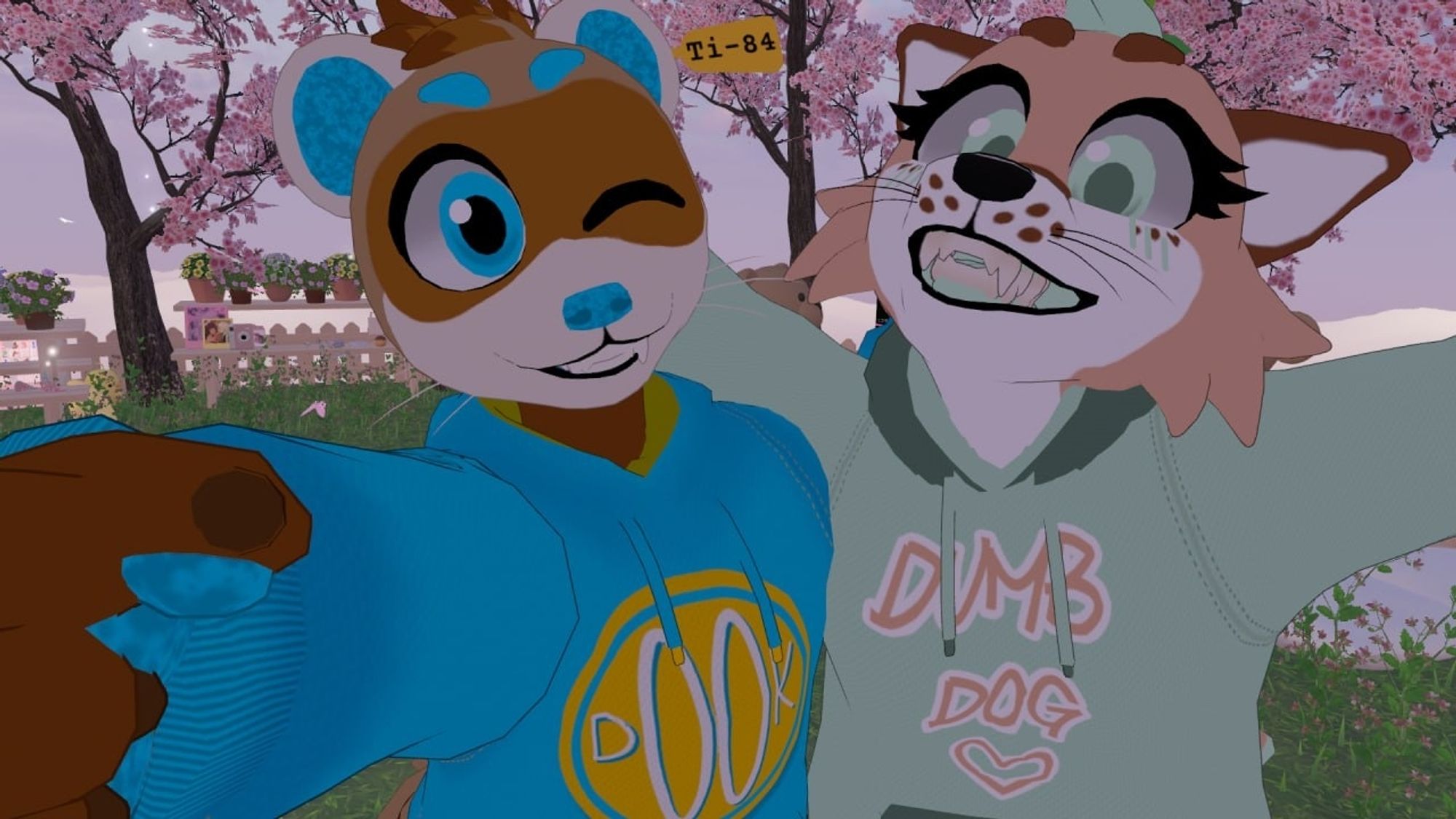 Virtual ferret and fox wearing hoodies smiling, selfie.