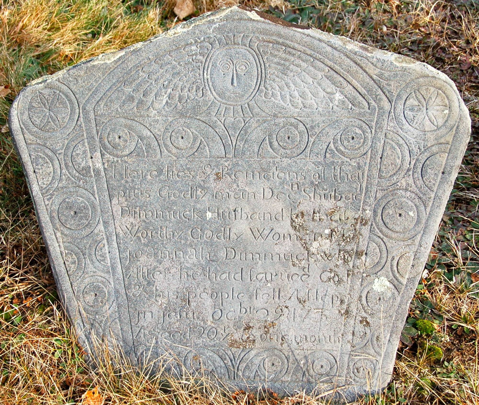 a more elaborate stone with more whorls, but basically the same pattern, with epitaph for "Decn Shubael Dimmuck Husband to that Worthy Godly Woman Mrs joannah Dimmuck"