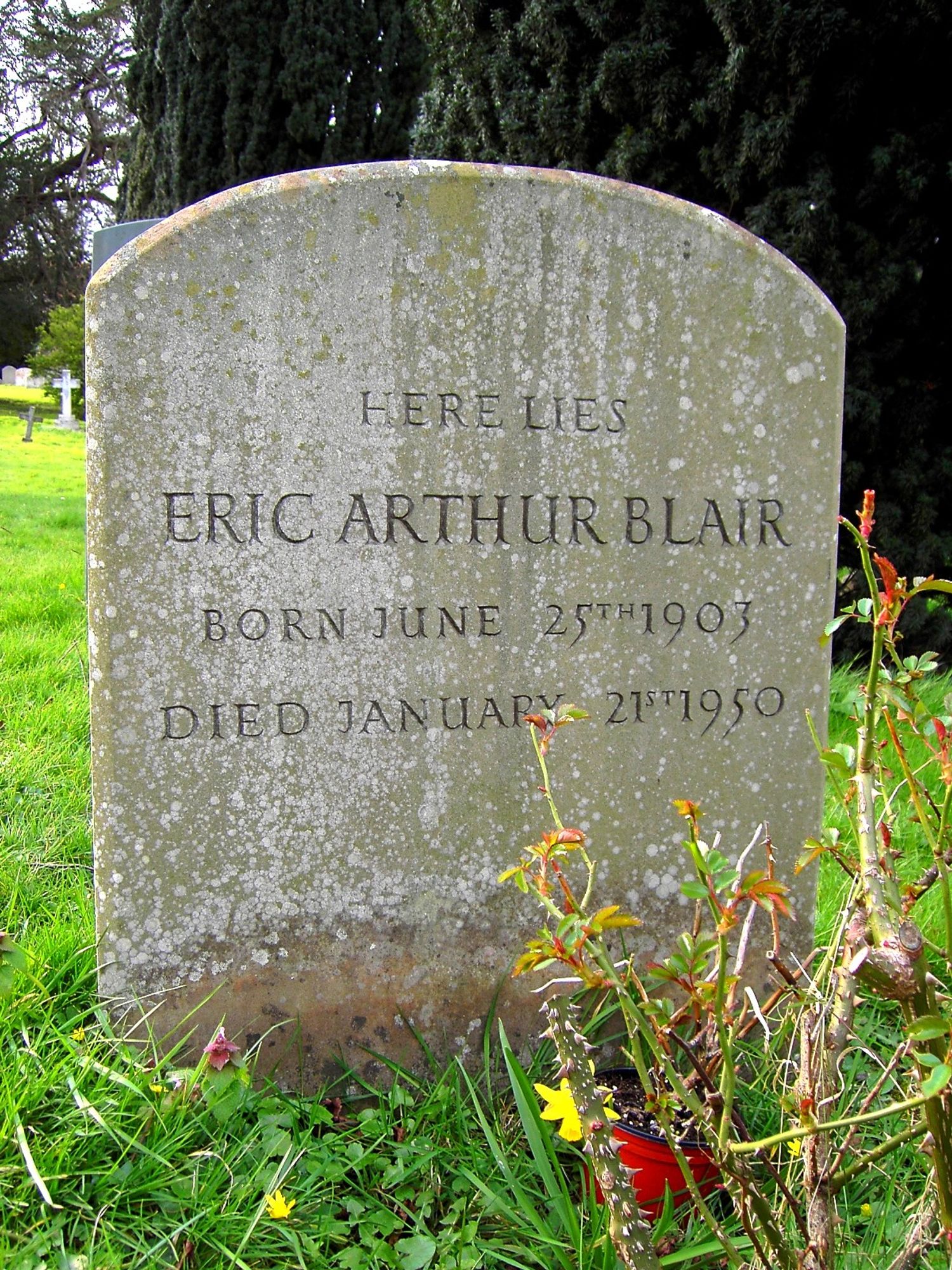 A rather plain headstone in tablet form, for Eric Arthur Blair