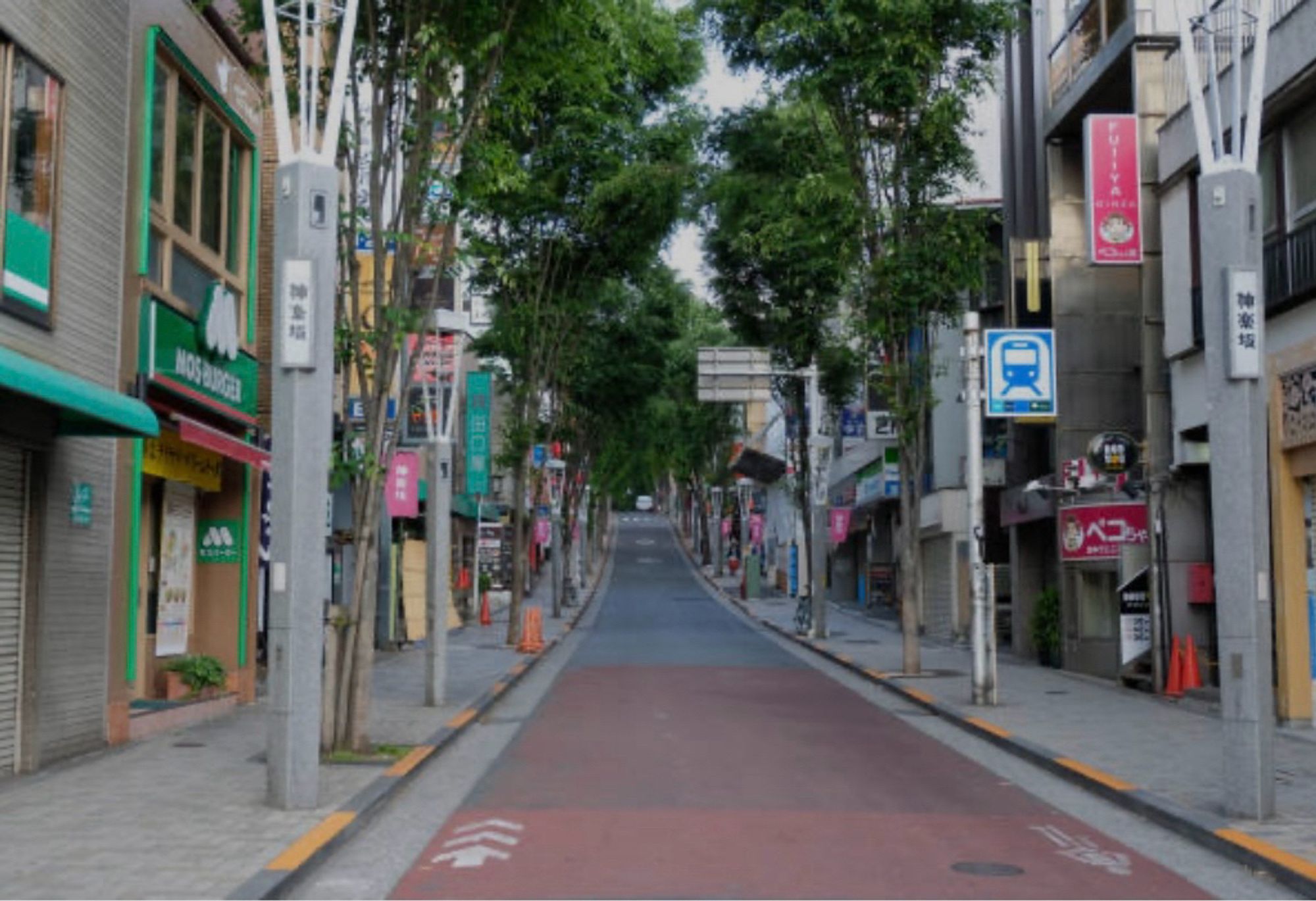 (Street in Kagurazaka): A street in Kagurazaka, Tokyo, lined with small shops and restaurants.