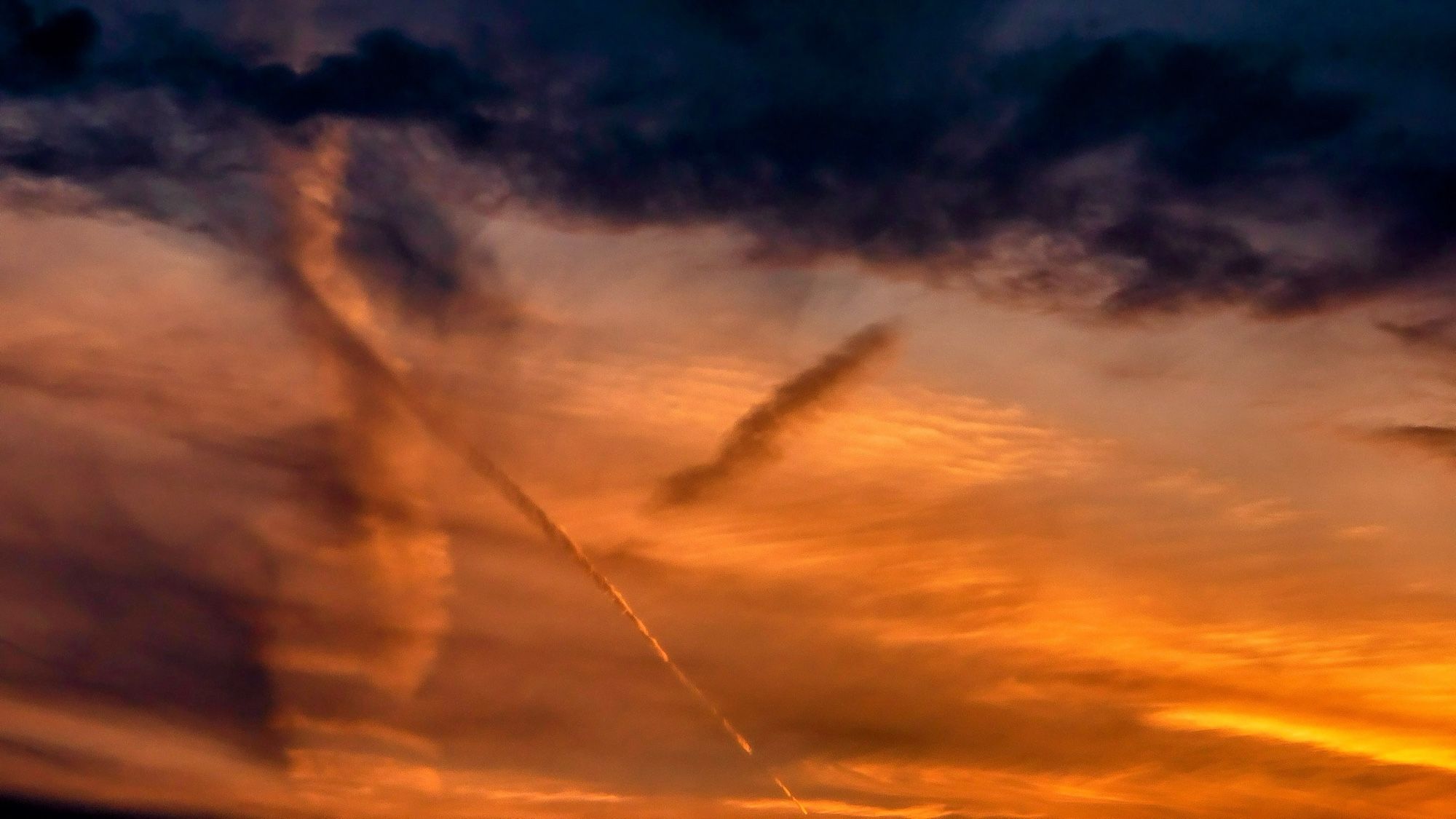 The setting sun lights up a bank of post-storm clouds over London, Ontario, Canada.