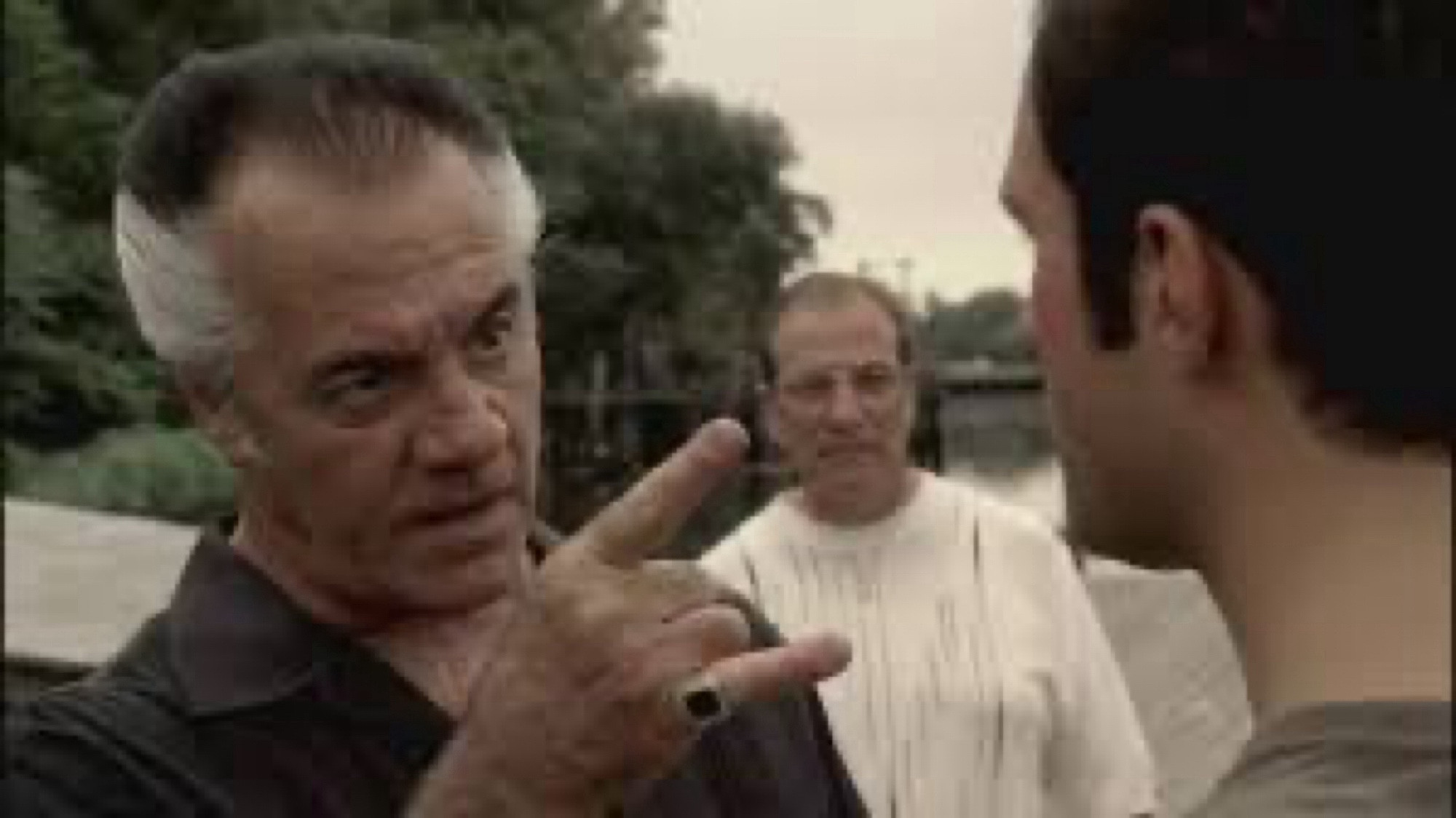 Paulie walnuts, a middle aged Italian American mobster from New Jersey, making the same hand shape