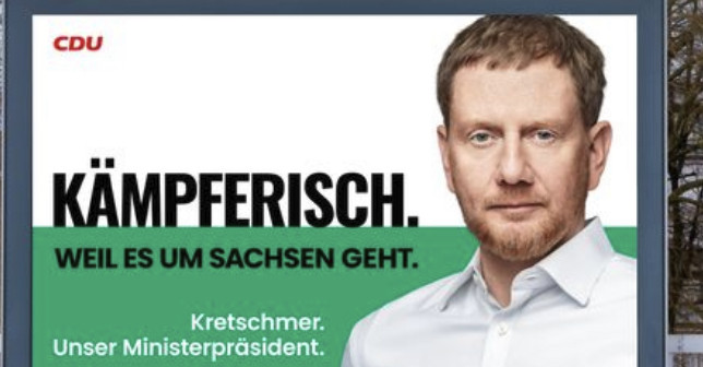 Wahlplakat von Michael Kretschmer in Dresden. Parole "Kämpferisch", Gesichtsausdruck eher technischer K.O.