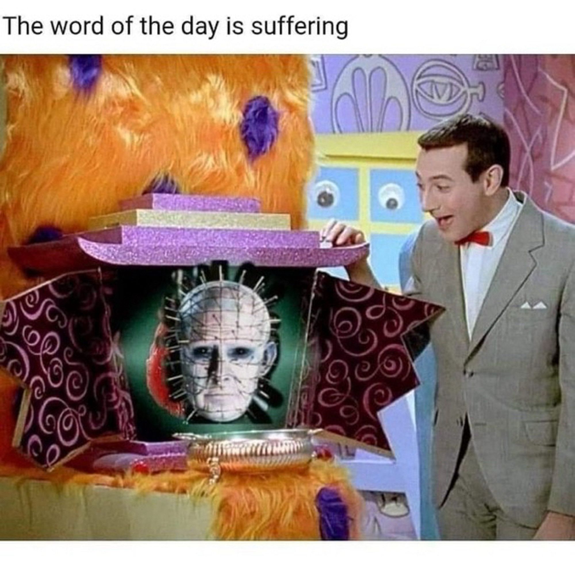 Peewee Herman opening the lament configuration, captioned:
The word of the day is suffering