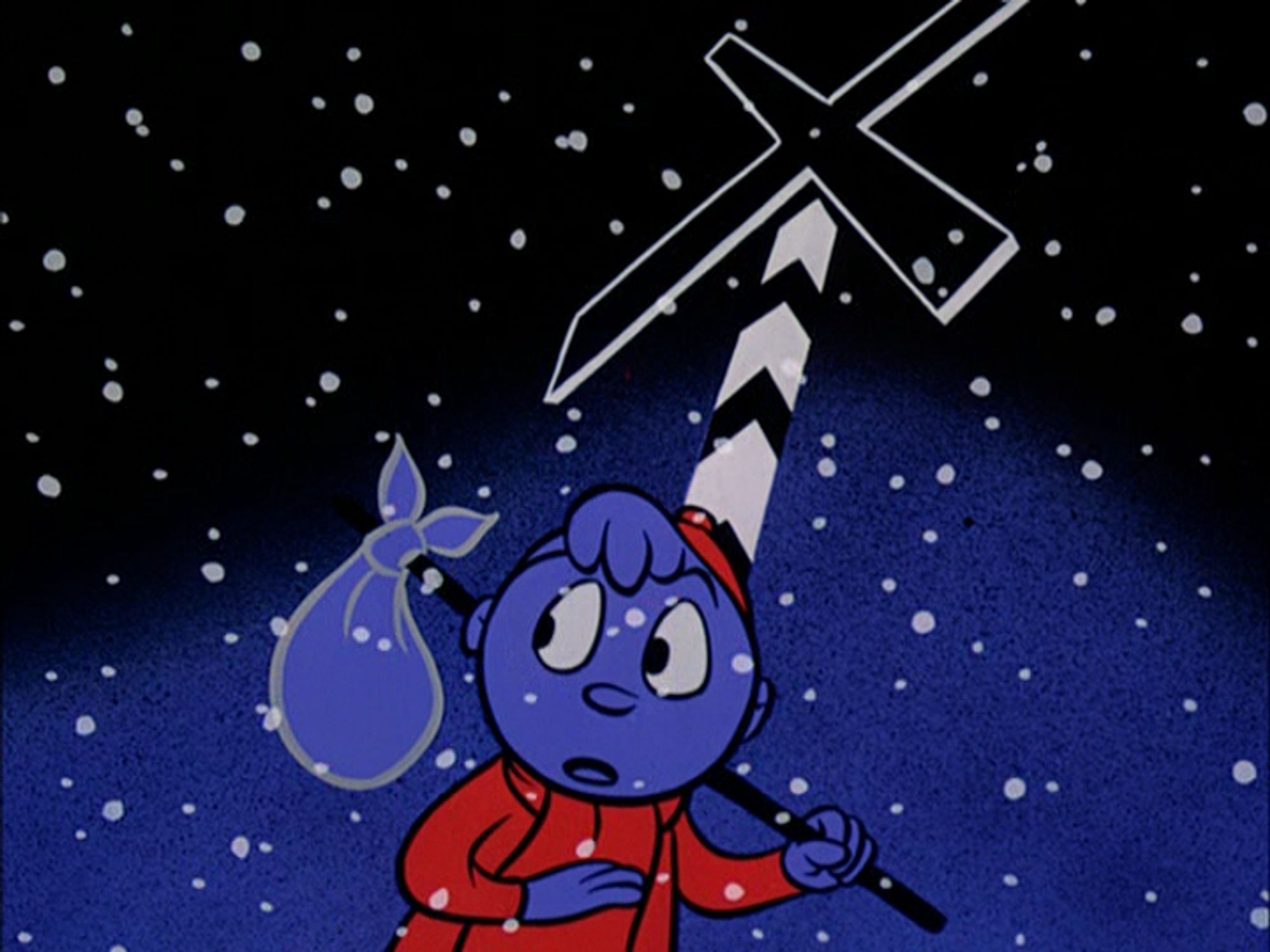 Still from Gerald McBoing Boing. Gerald has a bindle slung over his shoulder and is standing by a railroad crossing sign at night as snow falls around him. He looks back warily