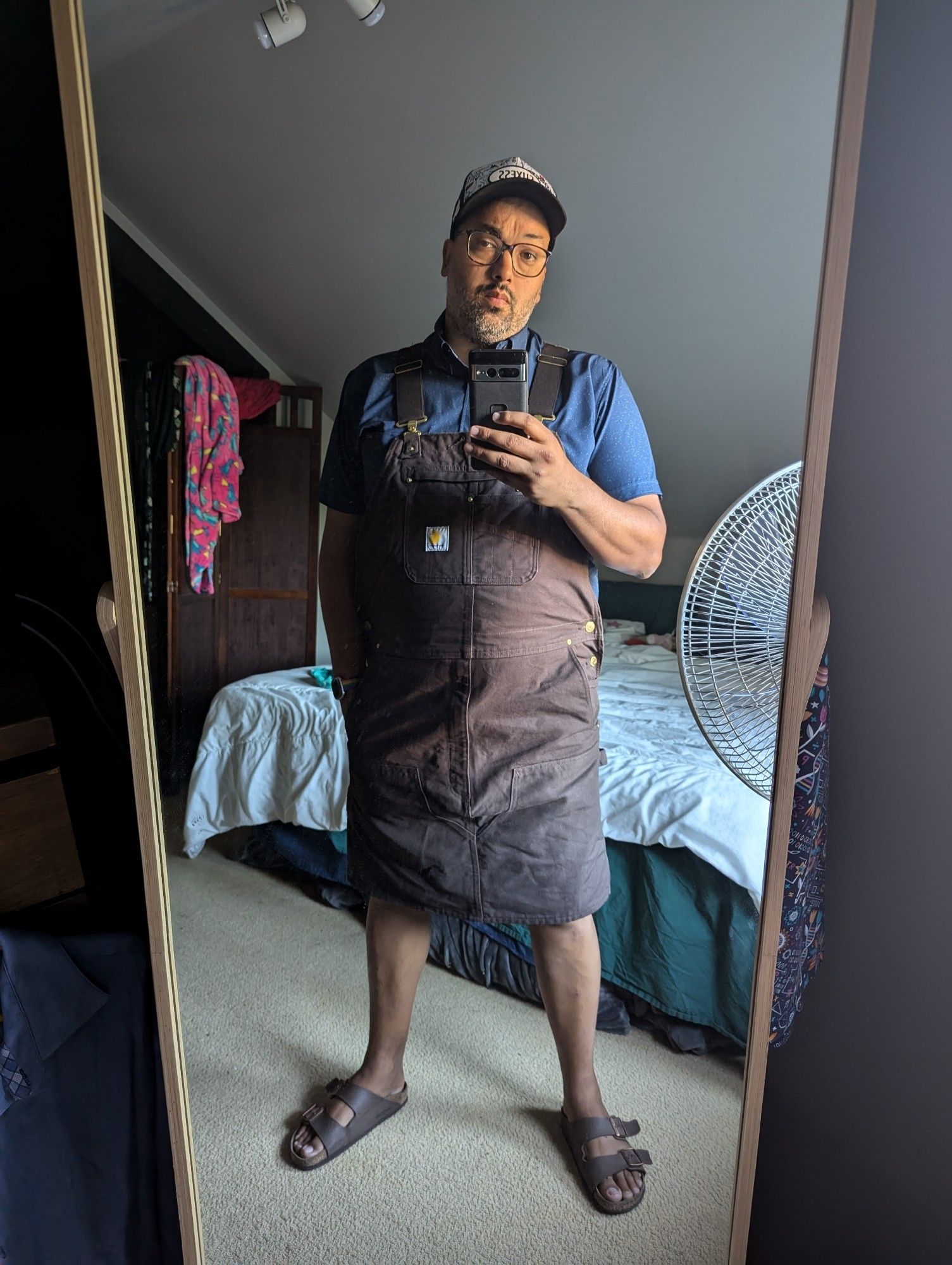 Overalls dress on a masc person