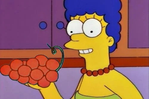 Marge Simpson “I just think they’re neat” meme but she’s holding a bunch of grapes