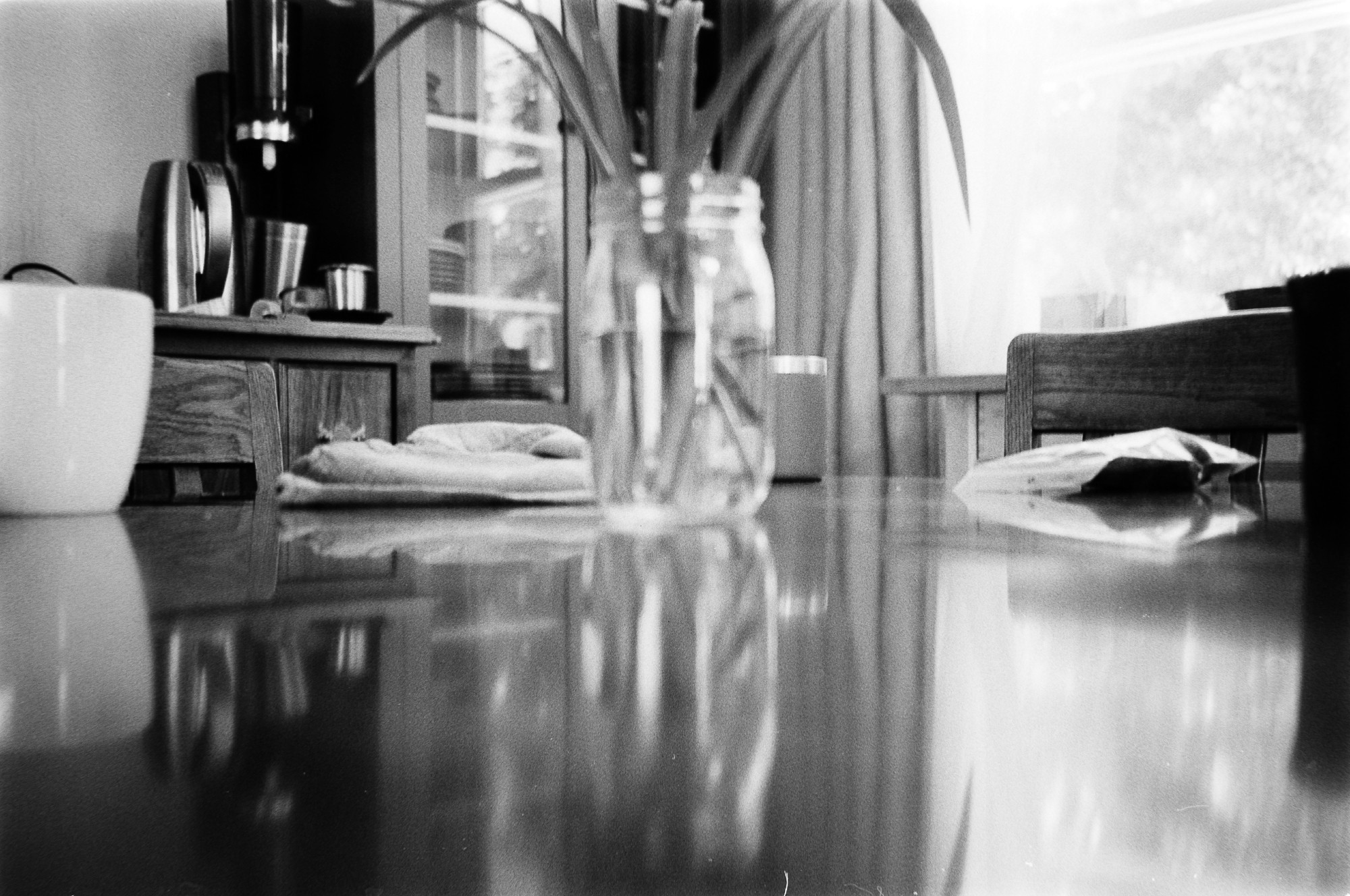 Reflections from the surface of the kitchen table.