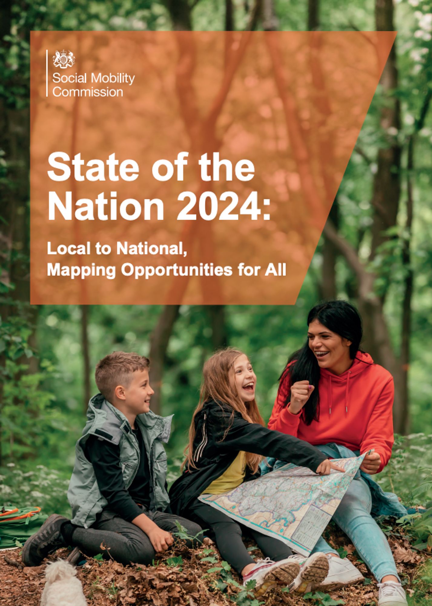 The image is the cover of the Social Mobility Commission’s report titled State of the Nation 2024: Local to National, Mapping Opportunities for All. The background features a natural setting with trees and greenery, creating a peaceful outdoor environment. In the foreground, three people—two children and one adult—are sitting on the ground together, smiling and engaged in an activity involving a large map. The adult wears a red hoodie and blue jeans, while the children are casually dressed for an outdoor setting. The title and subtitle of the report are prominently displayed in white text against a semi-transparent, orange geometric overlay in the top-left corner. The logo of the Social Mobility Commission is positioned above the title.