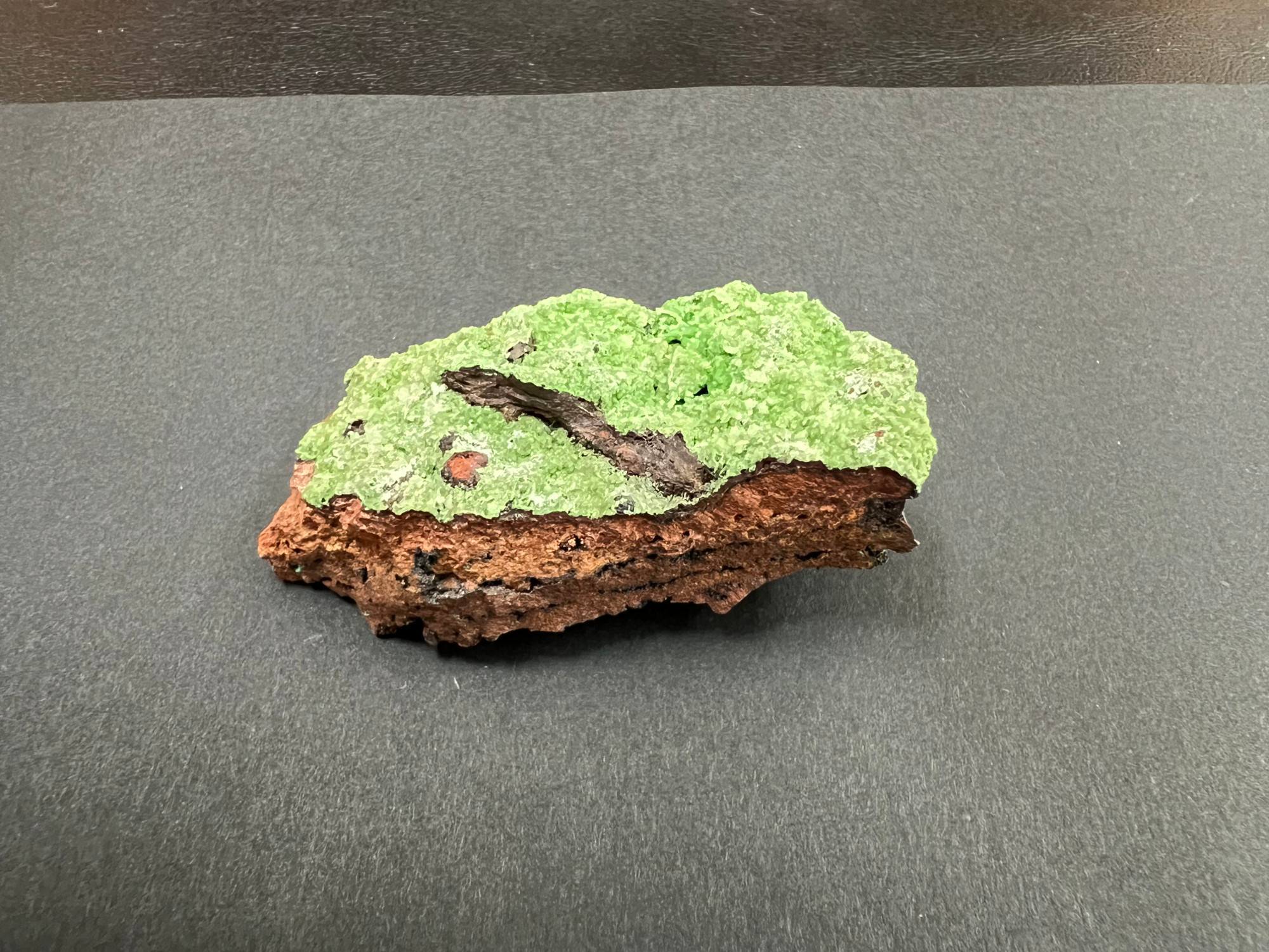 Conichalcite and celadonite (both are green).