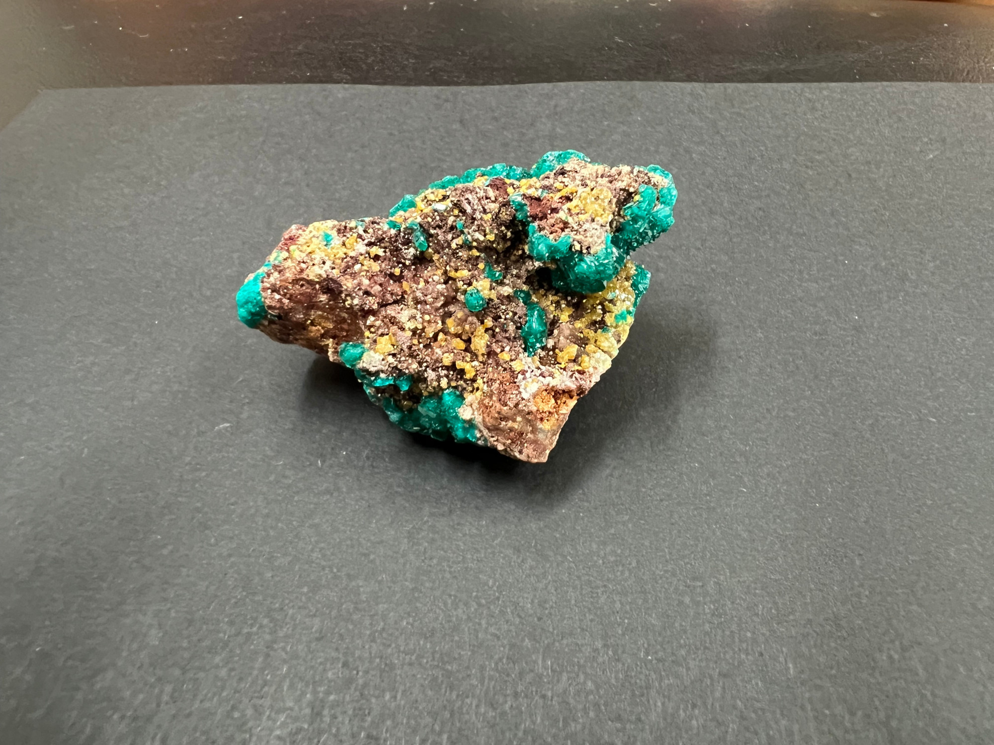 Dioptase (turquoise crystals) and mimetite (yellow crystals).