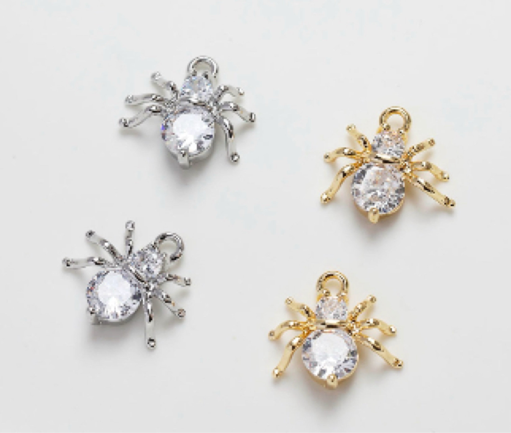 Diamond gold and silver spider charms