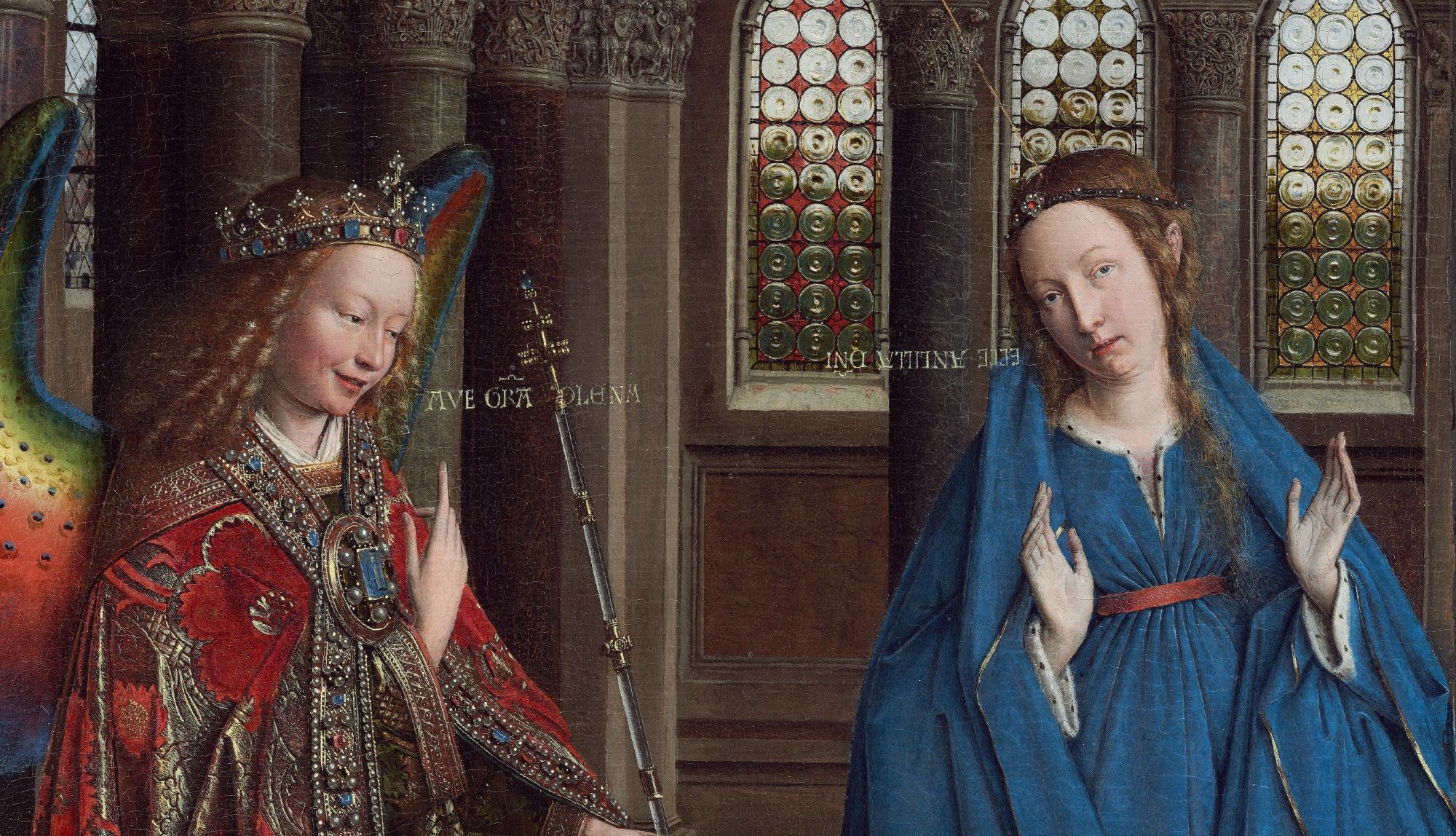 Detail from Van Eyck's Annunciation, with ornate gold letters going between the angel and the Virgin Mary.