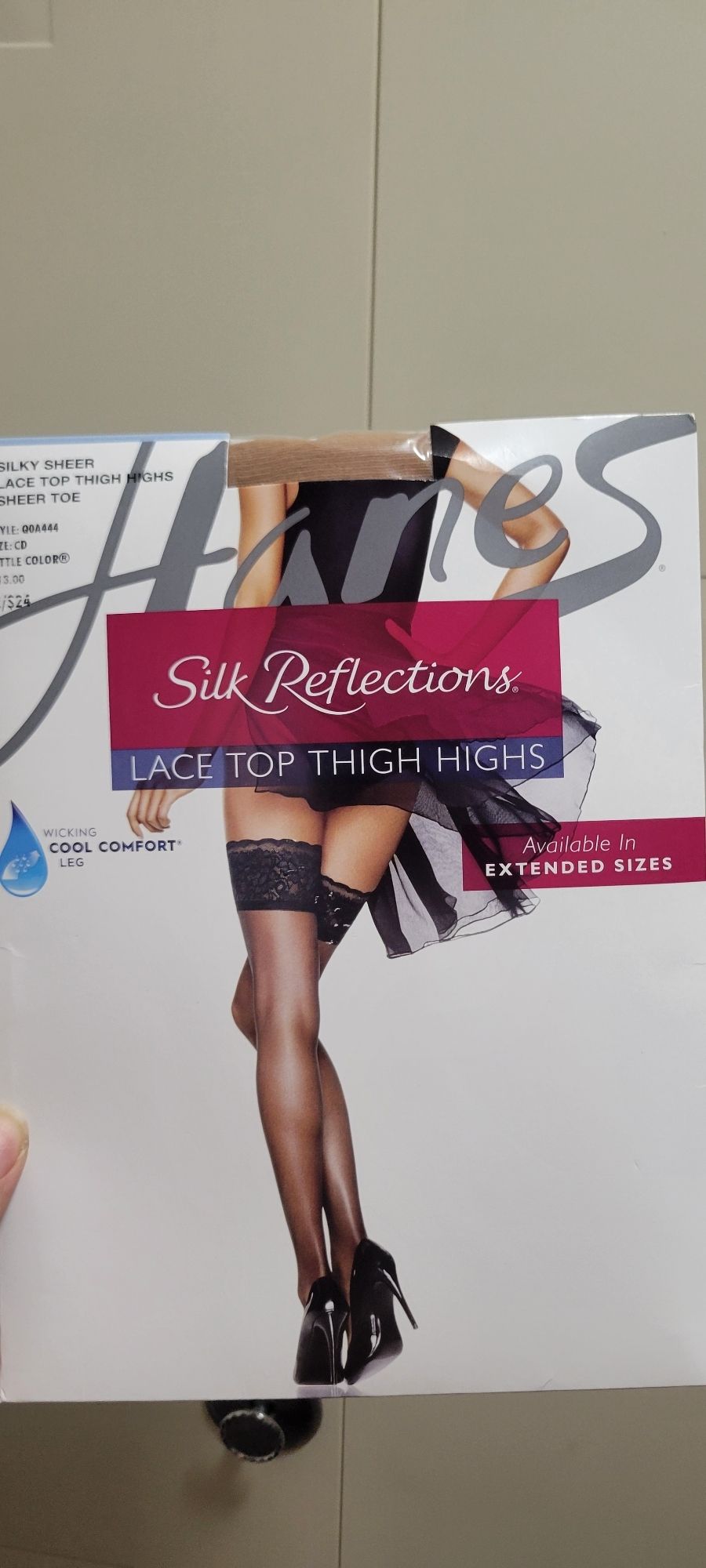 A package of nude thigh-high stockings by Silk Reflects