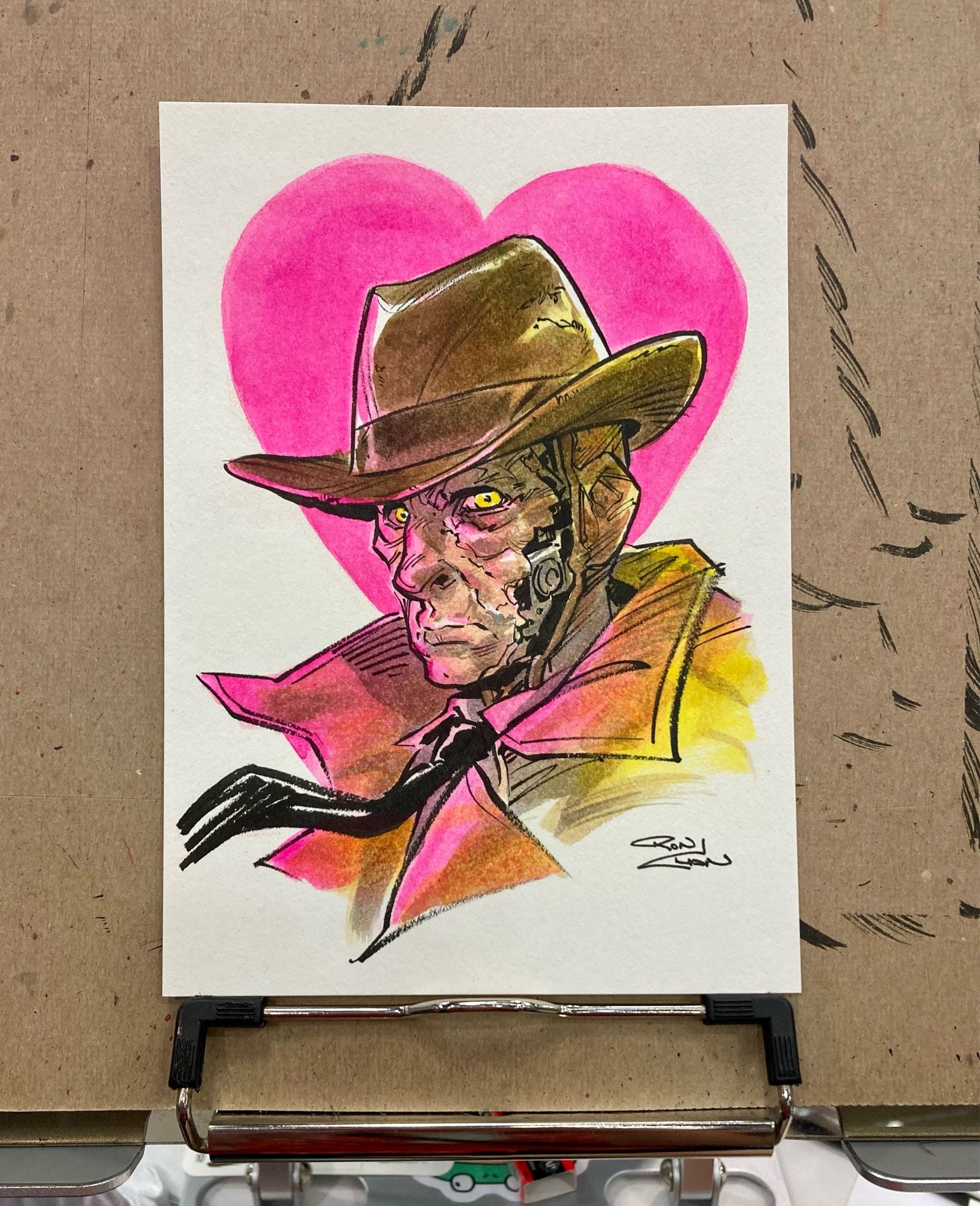 Watercolor art of Nick Valentine from Fallout. He's a detective with fedora and trench coat. Broken cracks in his head reveal that he is an android. A pink heart serves as a background to the portrait.