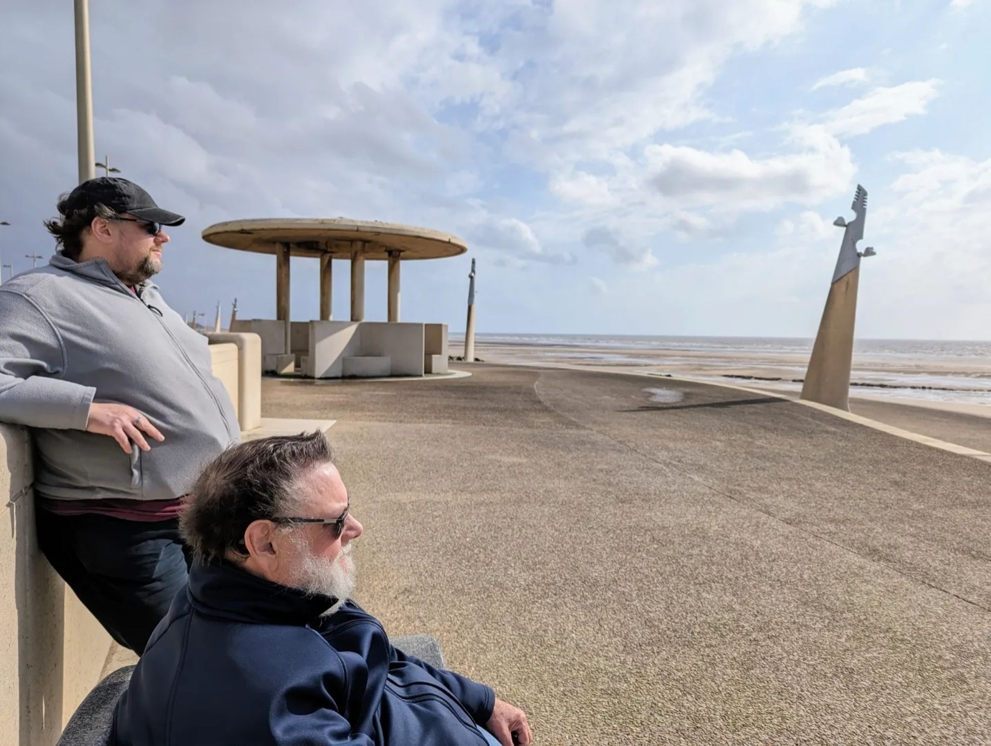 Rob and Dad looking cold as they gaze out to sea