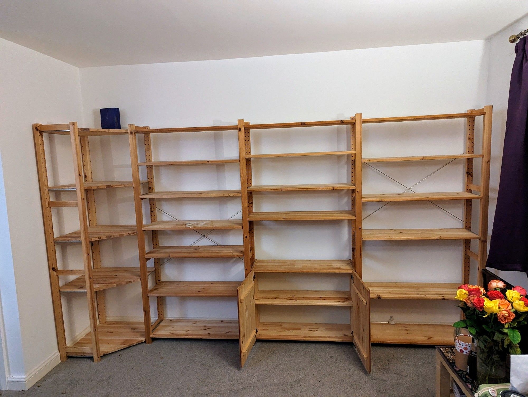 My old IKEA bookcases in unfinished pine looking a bit scruffy. They have done sterling work, but it's time for a change and I've found them a new home