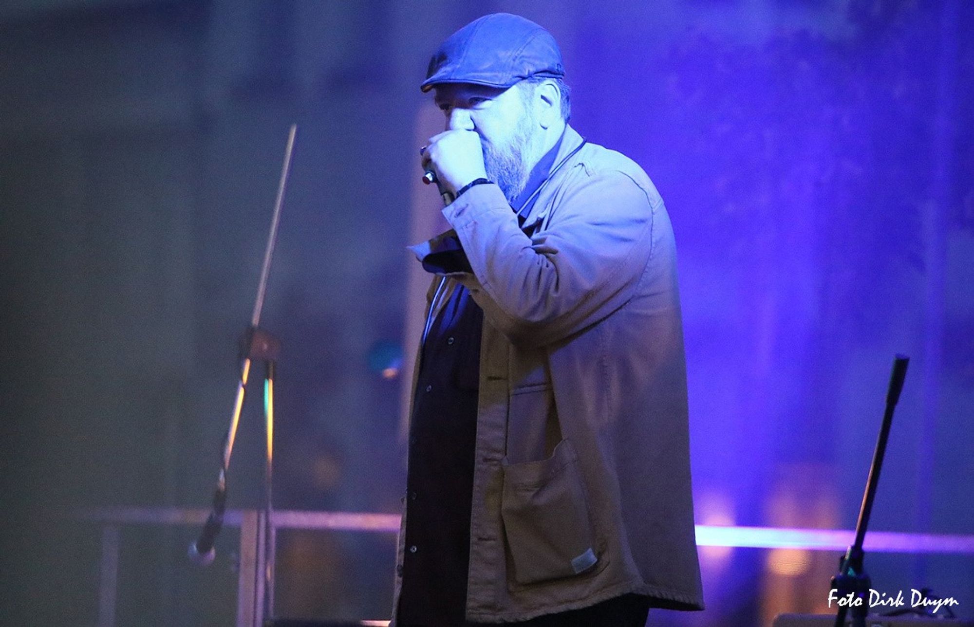 Me, playing some blues harmonica on stage at the Summerfest (benefit for VZW Pinocchio, a non-profit organization for younglings with burns) in Hamme (BE).