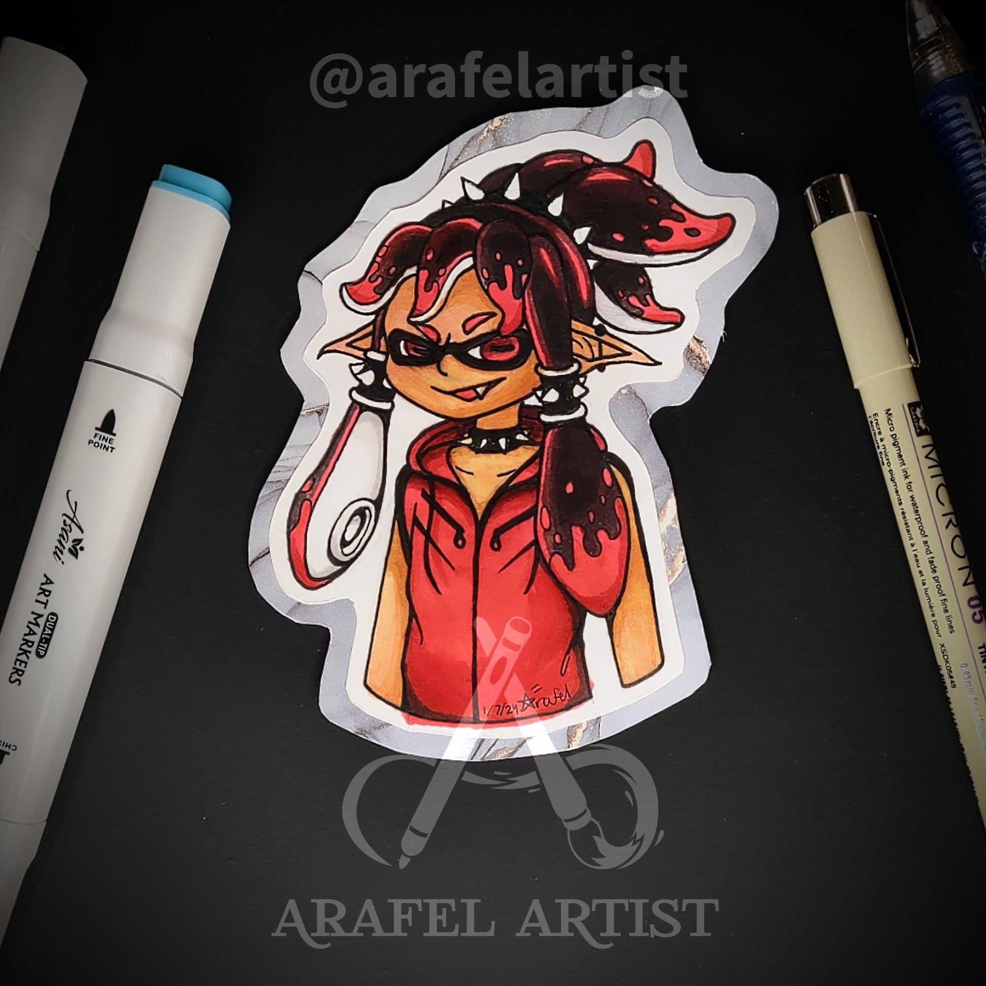 A human like character with black tentacles for hair. These tentacles have red ends looking like ink splatters. They wear a red jacket and spiked accessories on their neck and tentacles. This character has been made into a badge with a grey boarder.