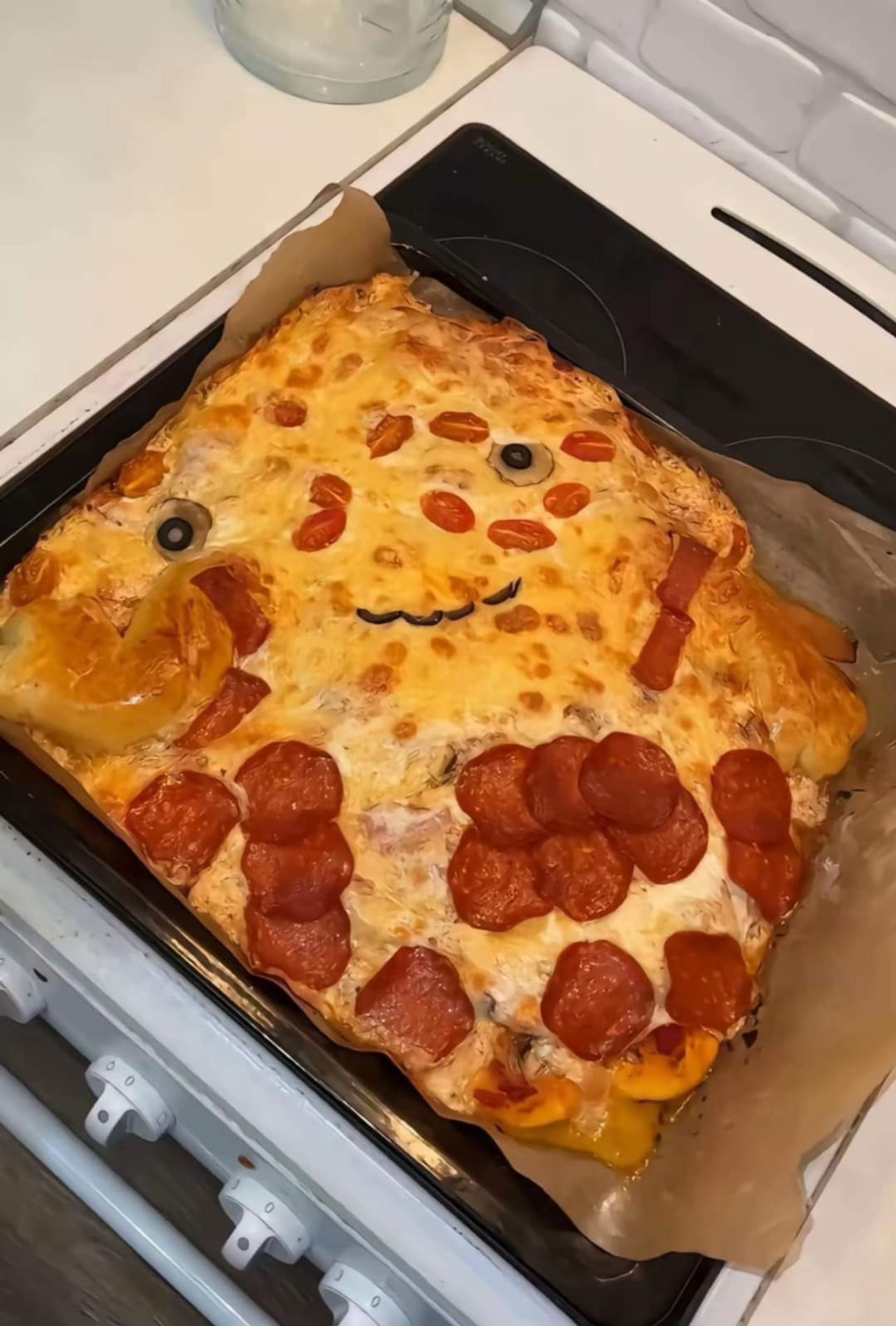 The cooked pie which has just dissolved into a blorp of cheese and haphazardly scattered toppings, resembling a Minion that was locked in the sarcophagus at Chernobyl.