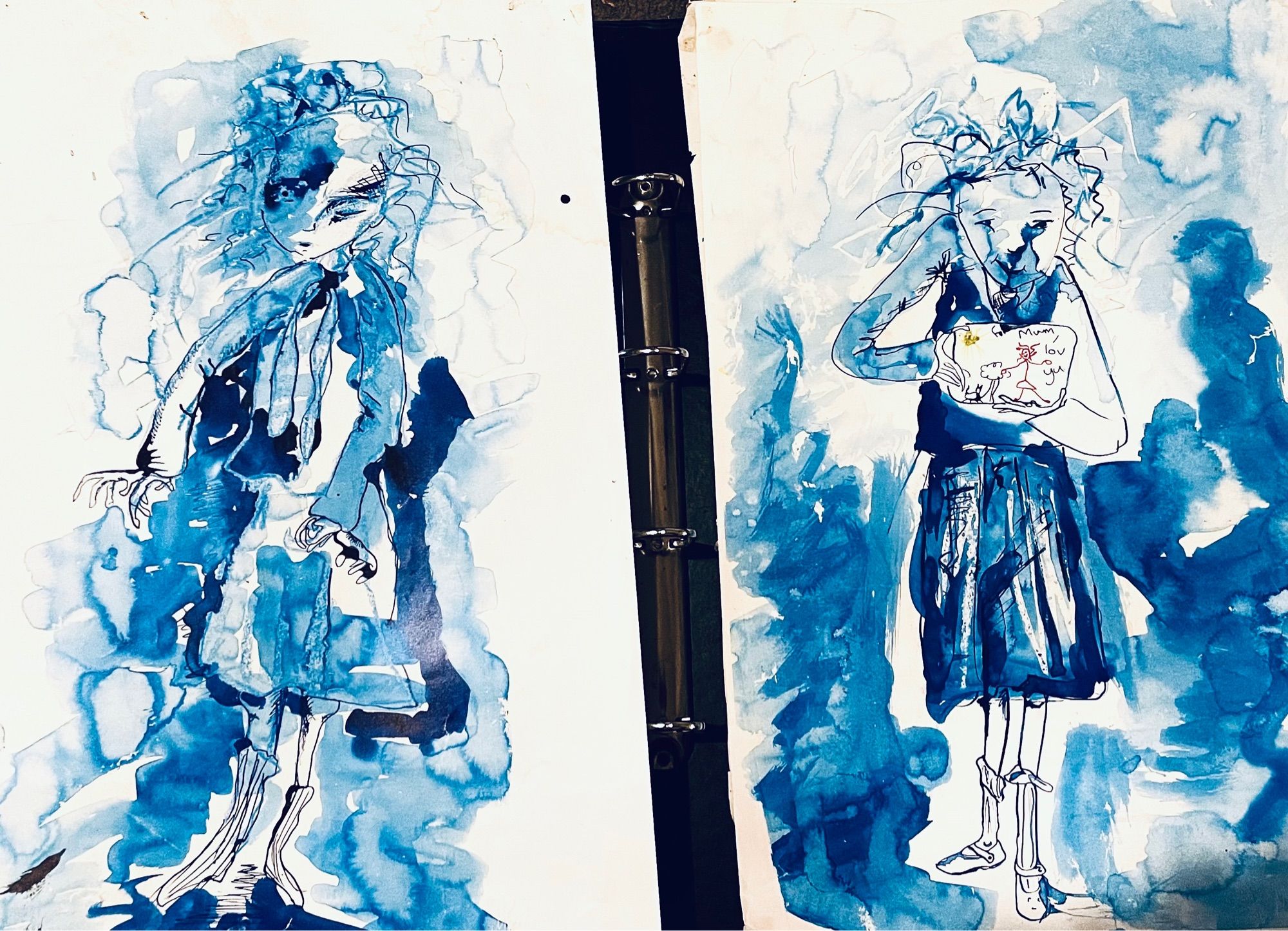 Two messy blue ink drawings of little girls 
A little girl i called Ingrid