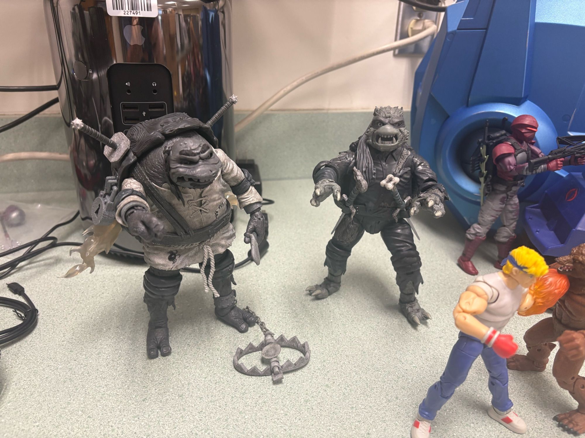 Universal Monsters x TMNT Wolfman Raphael and Hunchback Leonardo together from the front in the same poses previously described.