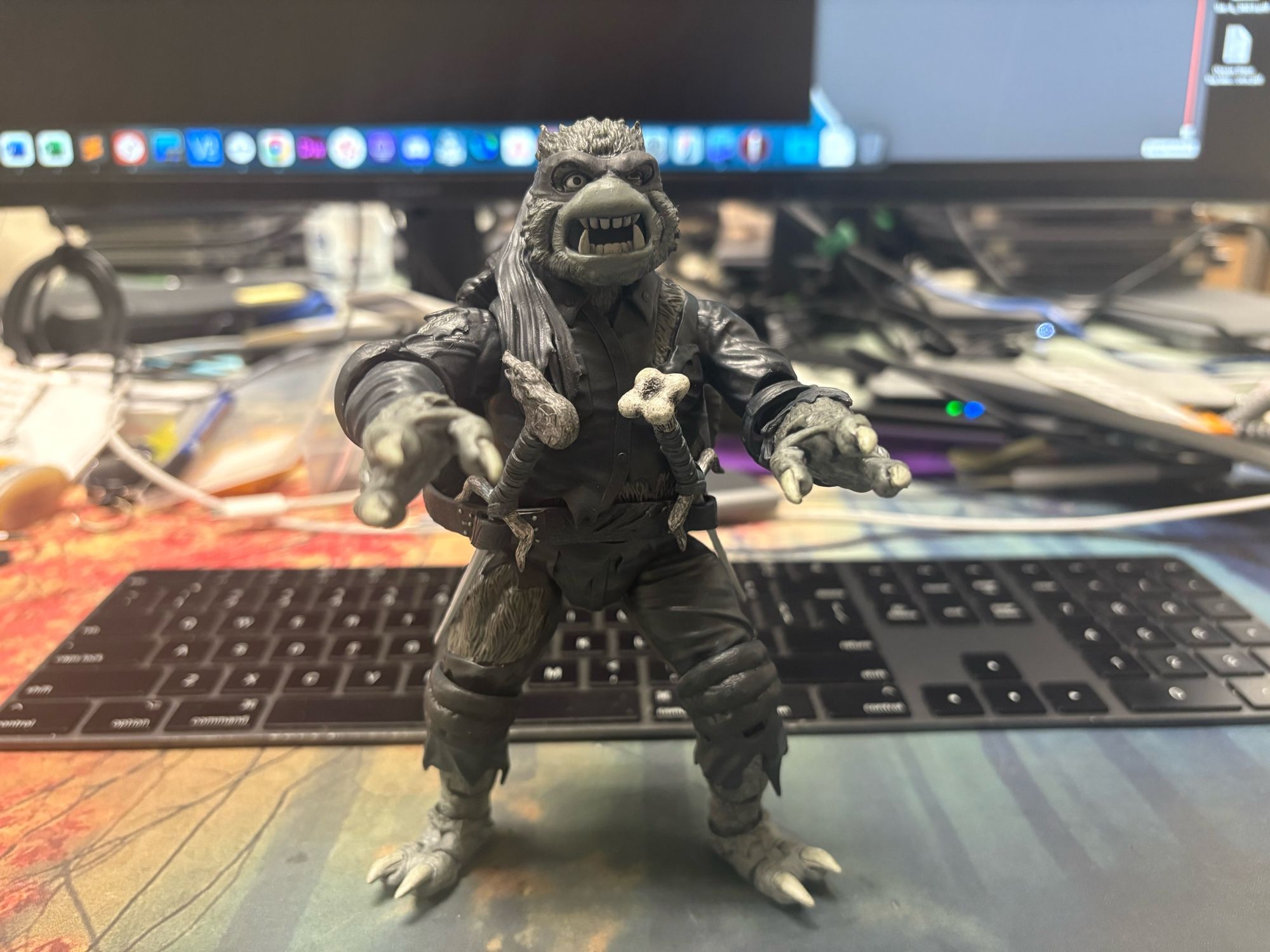 Universal Monsters x TMNT Wolfman Raphael from the front, arm out stretched towards the camera.