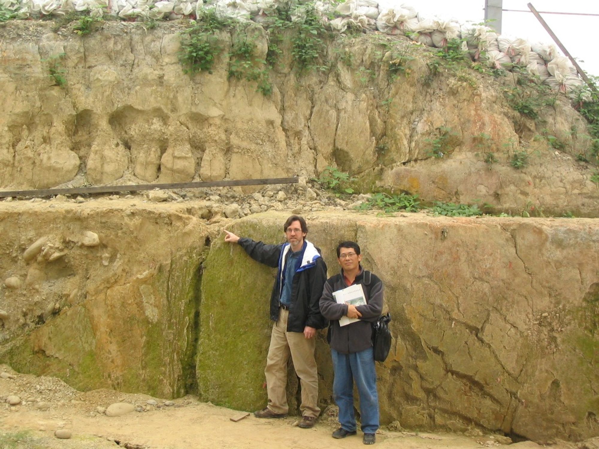 Amazing 6 meter deep trench into the Chelungpu fault surface rupture, with the fault plabe pointed out in 2004 by me, with Prof. Jyr-Ching Hu of NTU.