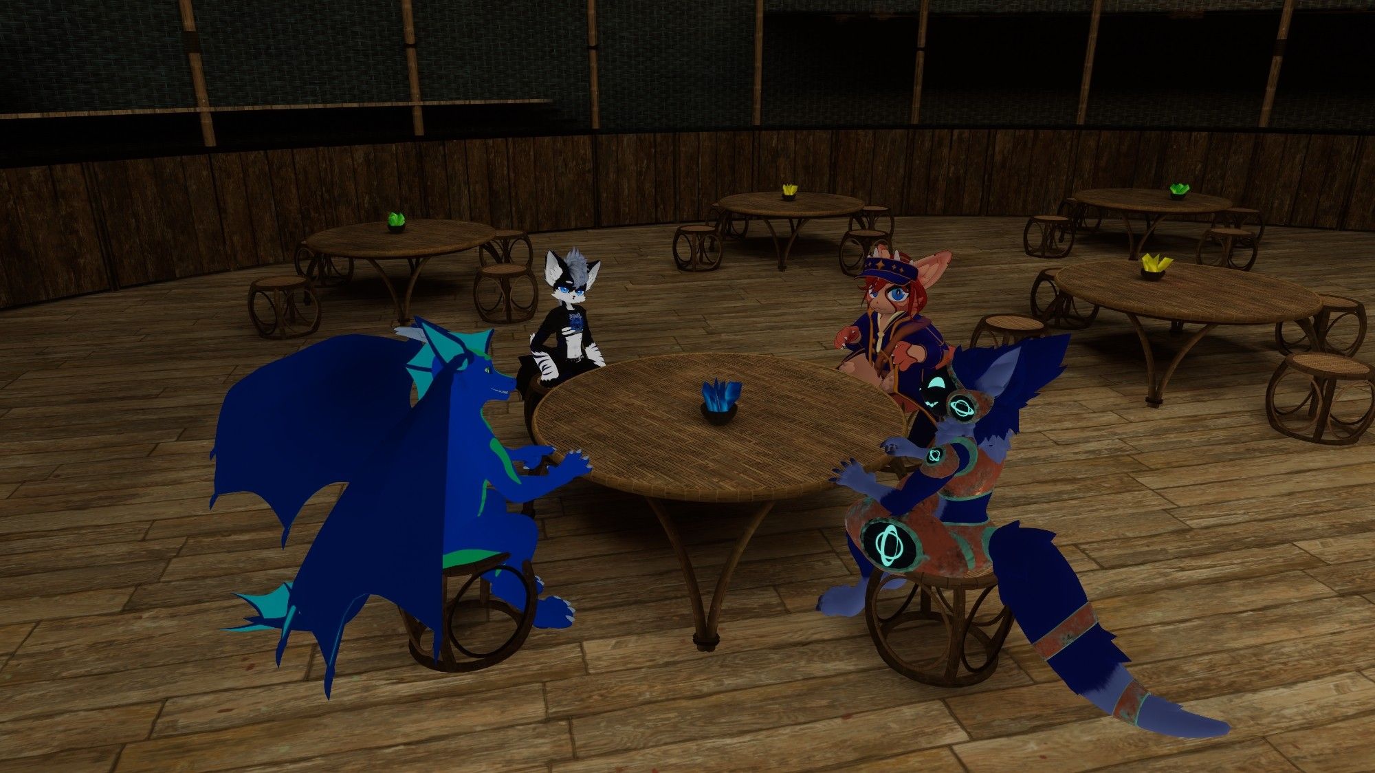 4 furry characters sitting around a wooden table in VRChat