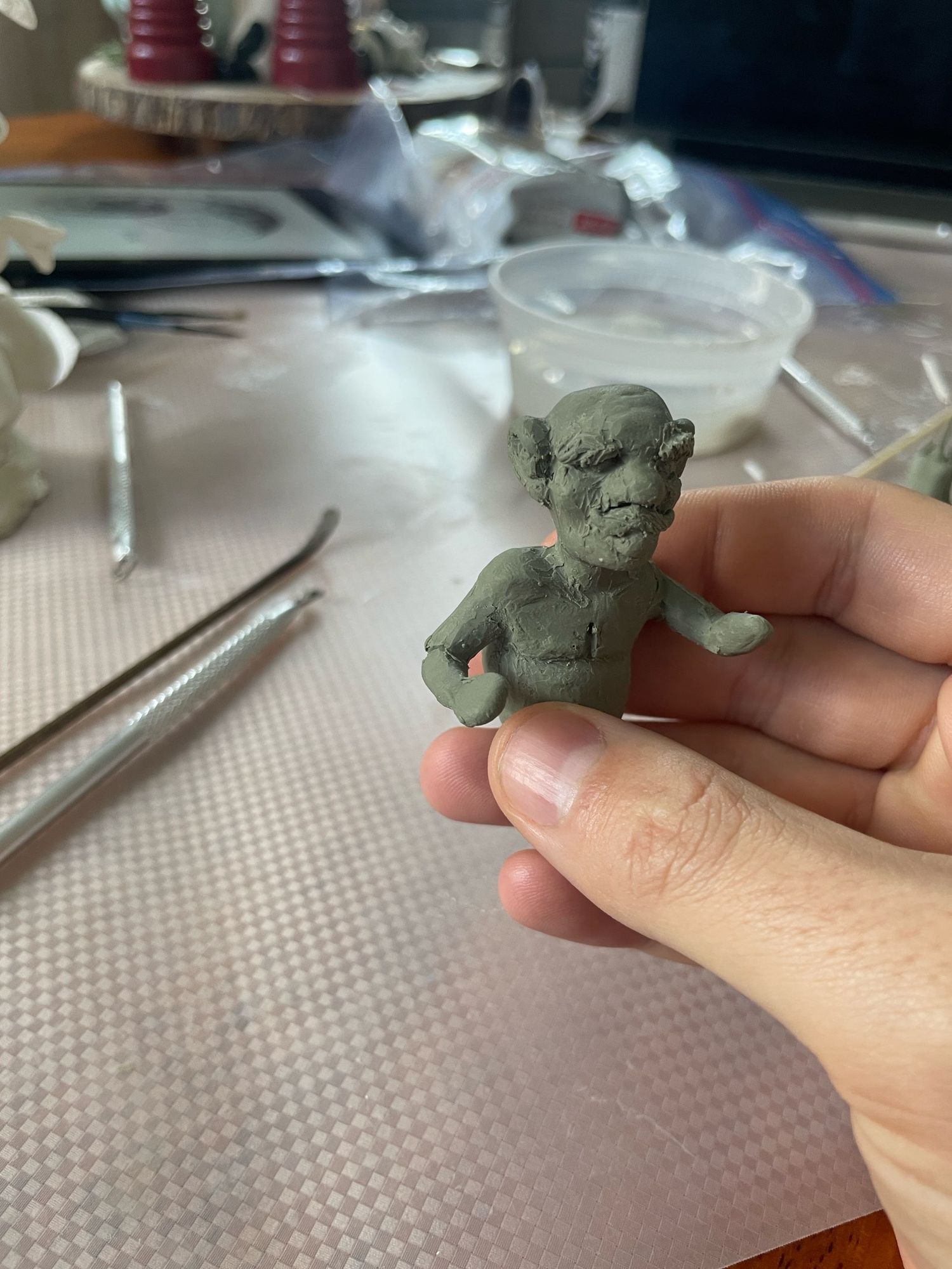 A miniature gnome or dwarf torso made from clay