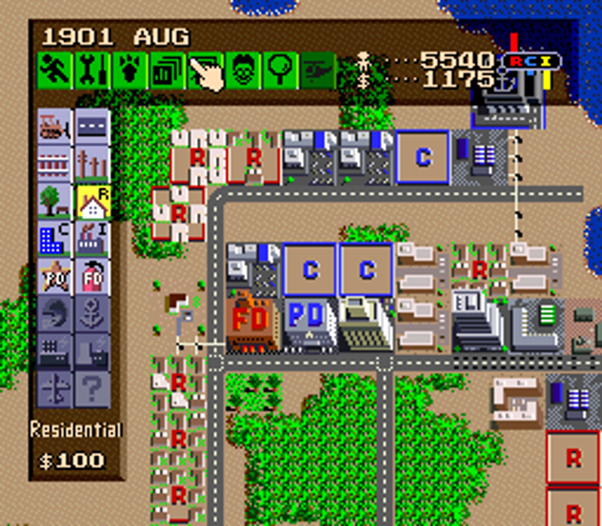 screenshot of Sim City island from the SNES: Very blocky grid layout, showing a few residential and commercial zones and some roads