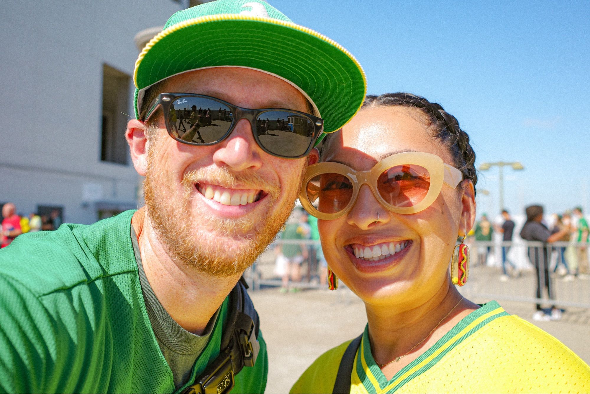 Ya boy Nace and his wife smiling outside of the coliseum.