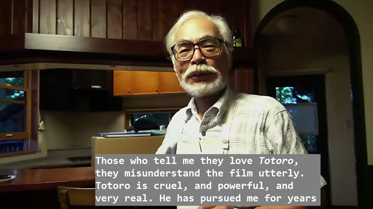 Miyazaki standing in his kitchen. The subtitle reads "Those who tell me they love Totoro, they misunderstand the film utterly. Totoro is cruel, and powerful, and very real. He has pursued me for years